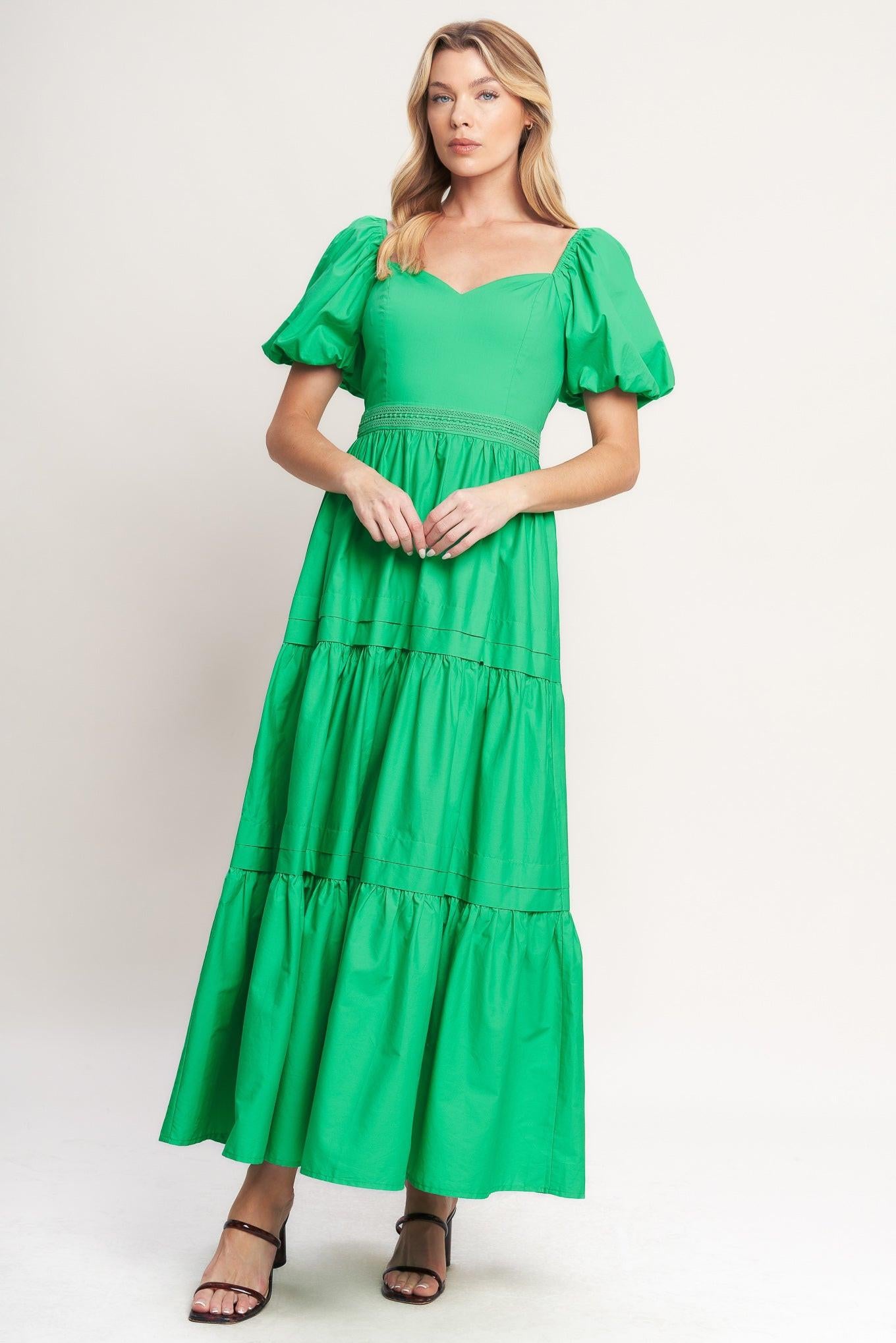 A solid woven maxi dress featuring sweetheart neckline, short puff sleeve, lace contrast waistband, tiered skirt and back zipper closure
Details:
Self: 100% Cotton
Lining: 100% Polyester
Size & Fit
-Model is 5`8" And Wearing Size Small
-Measurements Taken From Size Small
-Approx. Length: 54"