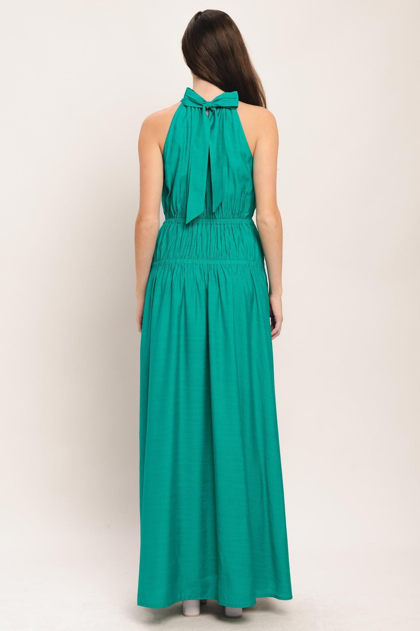 A solid woven maxi dress featuring halter neckline with back tie and elastic waist
Details:
Self: 65% Rayon 35% Nylon
Lining: 100% Polyester
Size & Fit
-Model is 5`8" And Wearing Size Small
-Measurements Taken From Size Small
-Approx. Length: 60"