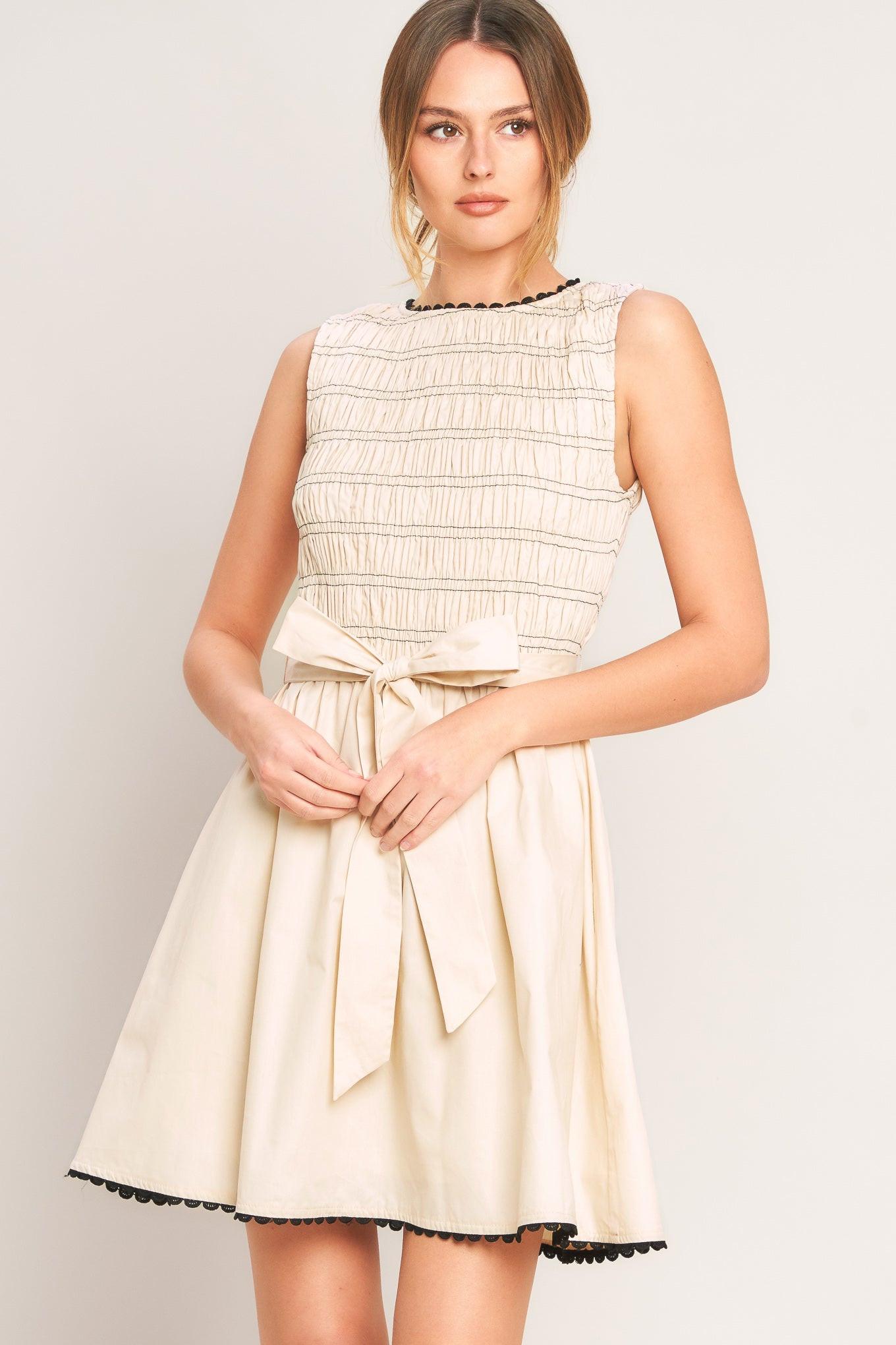 LOVELY ESCAPE WOVEN MINI DRESS.