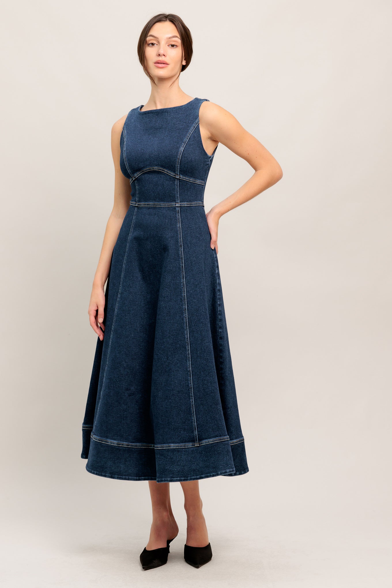 A washed denim midi dress featuring wide neckline, sleeveless, waist yoke, circle skirt and back zipper closure
Details:
Self : 55% Cotton 33% Polyester 10% Viscose 2% Spandex
Size & Fit
- Model is 5`8" And Wearing Size Small
- Measurements Taken From Size Small
- Approx. Length: 48" Flying Tomato