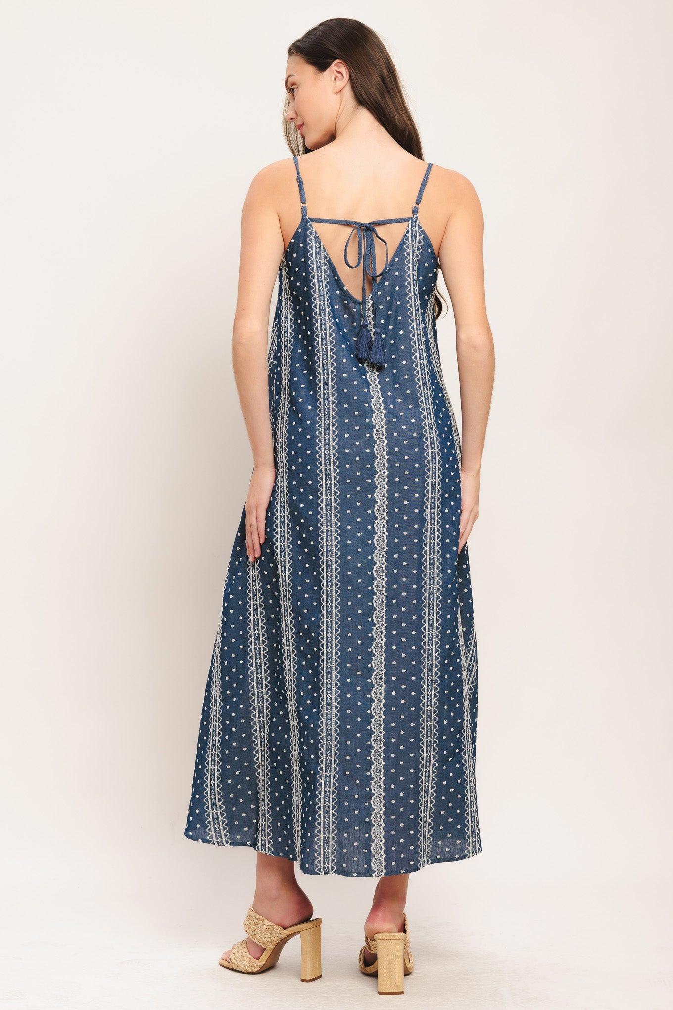 An embroidered woven midi dress featuring V neckline, straps and back tassel tie detail
Details:
Self: 65% Cotton 35% Polyester
Contrast: 65% Cotton 35% Polyester Exclusive of Decoration
Size & Fit
-Model is 5`8" And Wearing Size Small
-Measurements Taken From Size Small
-Approx. Length: 52"