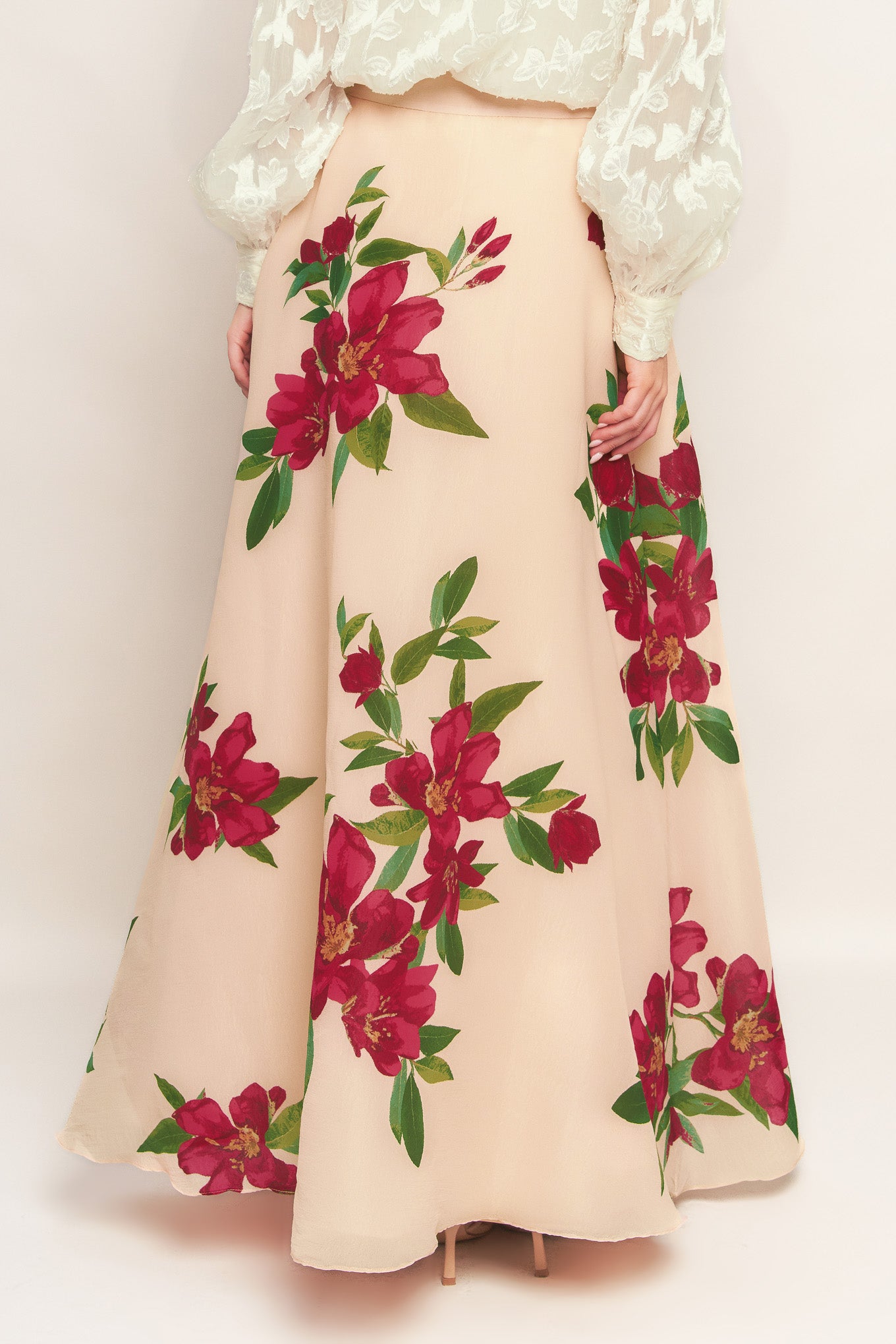 A floral printed woven maxi skirt with side zipper closure