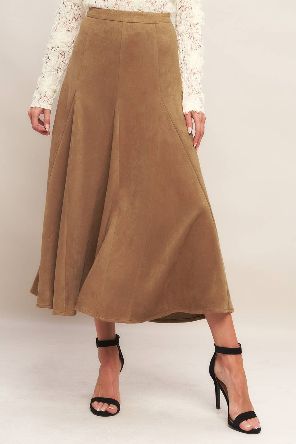 A faux suede midi skirt with back zipper closure