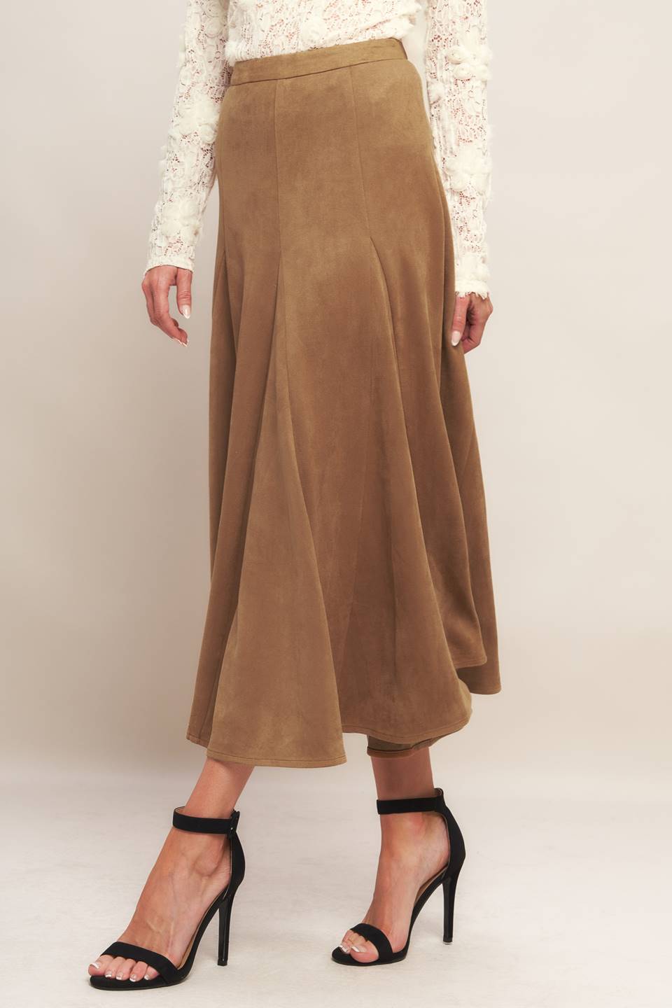 A faux suede midi skirt with back zipper closure