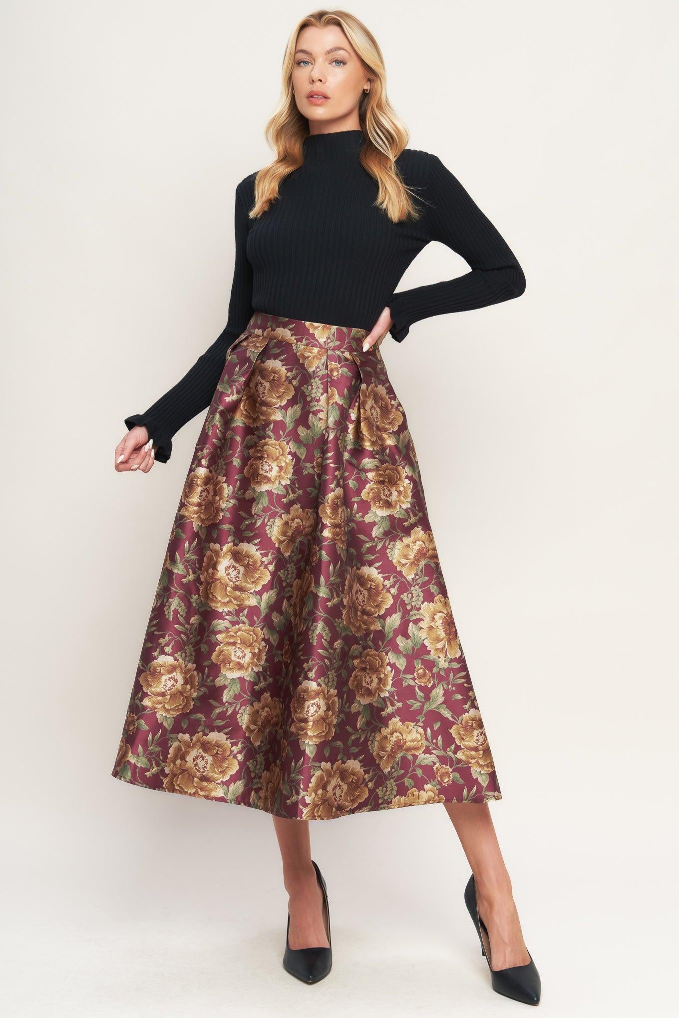 A brown floral printed woven full midi skirt with side zipper closure