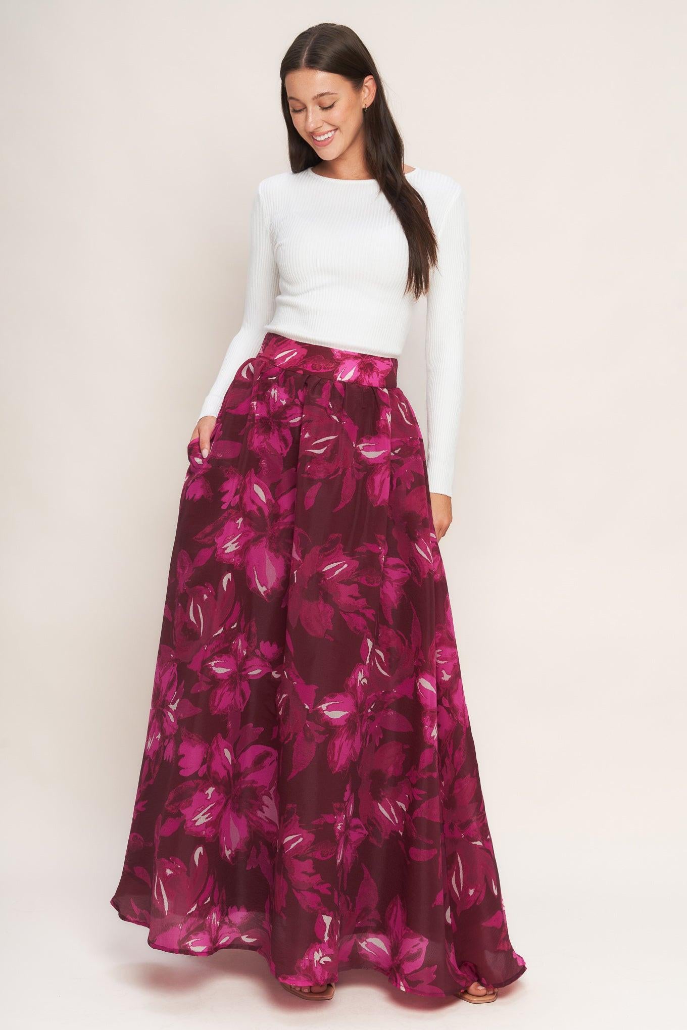 A printed woven maxi full skirt with back zipper closure