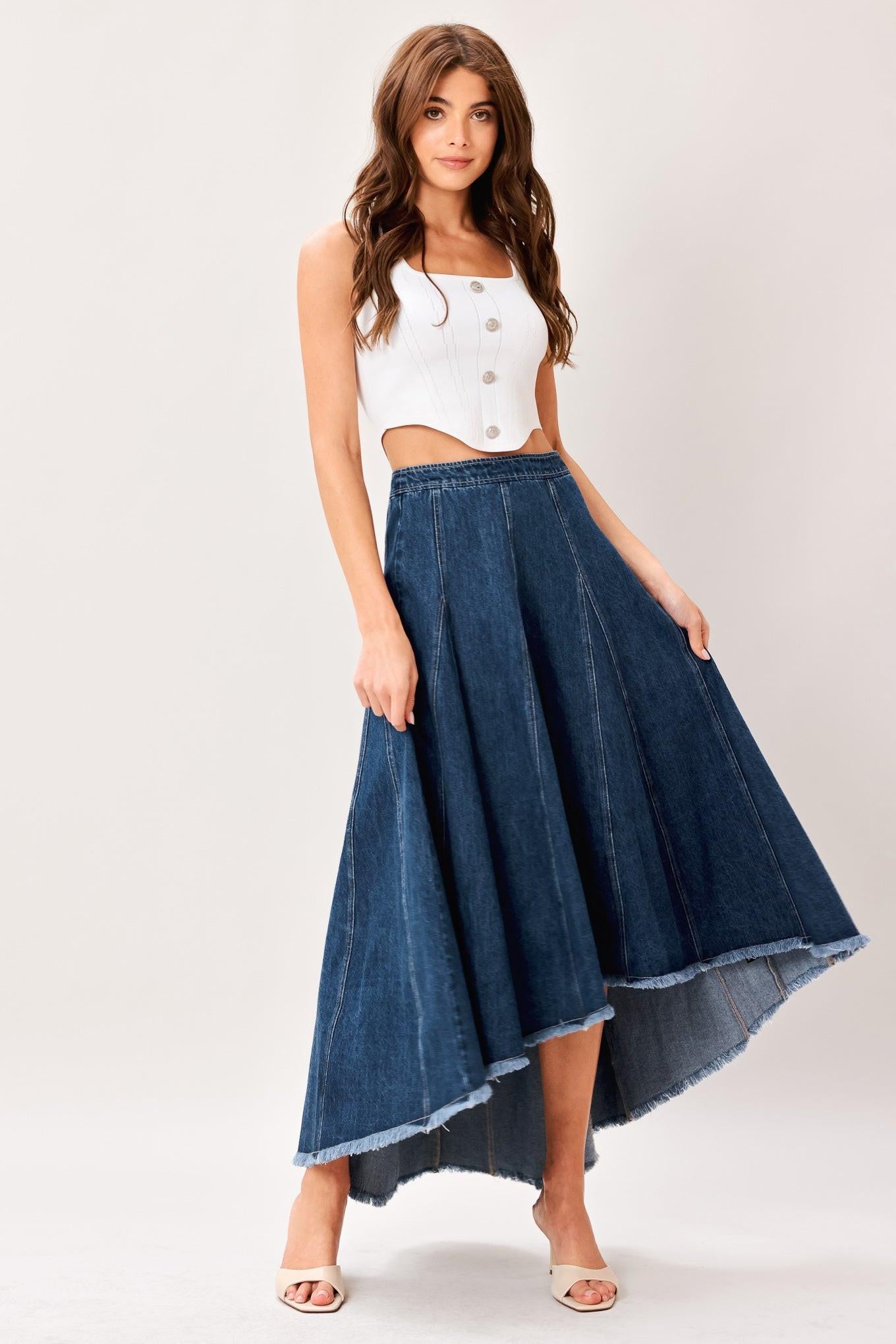 A washed denim hi-lo midi circle skirt with fray hem and back zipper closure
