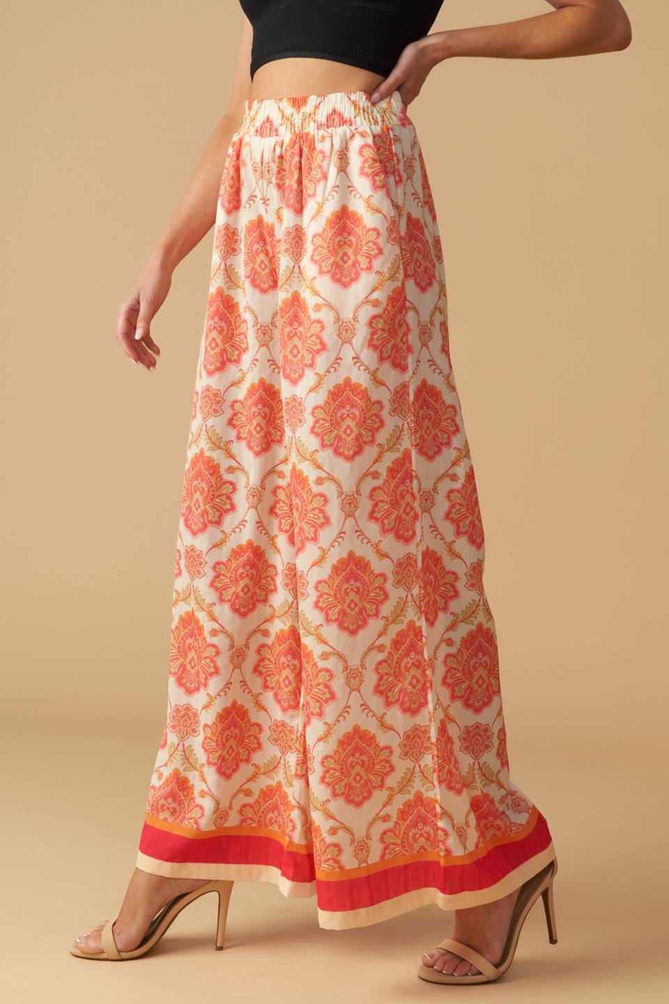 A printed woven wide-leg pant with an elasticized waistband. Matching top INTO THE NIGHT WOVEN TOP