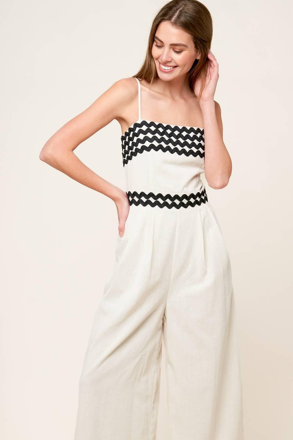 MEET AT THE PIER CREAM WOVEN JUMPSUIT.