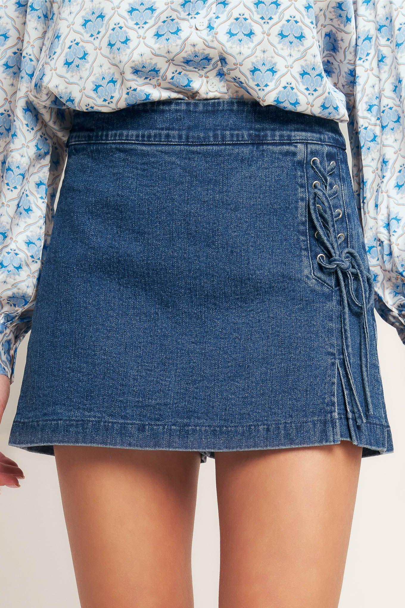 A washed denim skort with side lace up and zipper closure
Details:
Self : 99% Cotton 1% Spandex
Size & Fit
- Model is 5`8" And Wearing Size Small
- Measurements Taken From Size Small
- Approx. Length: 16" FLYING TOMATO
