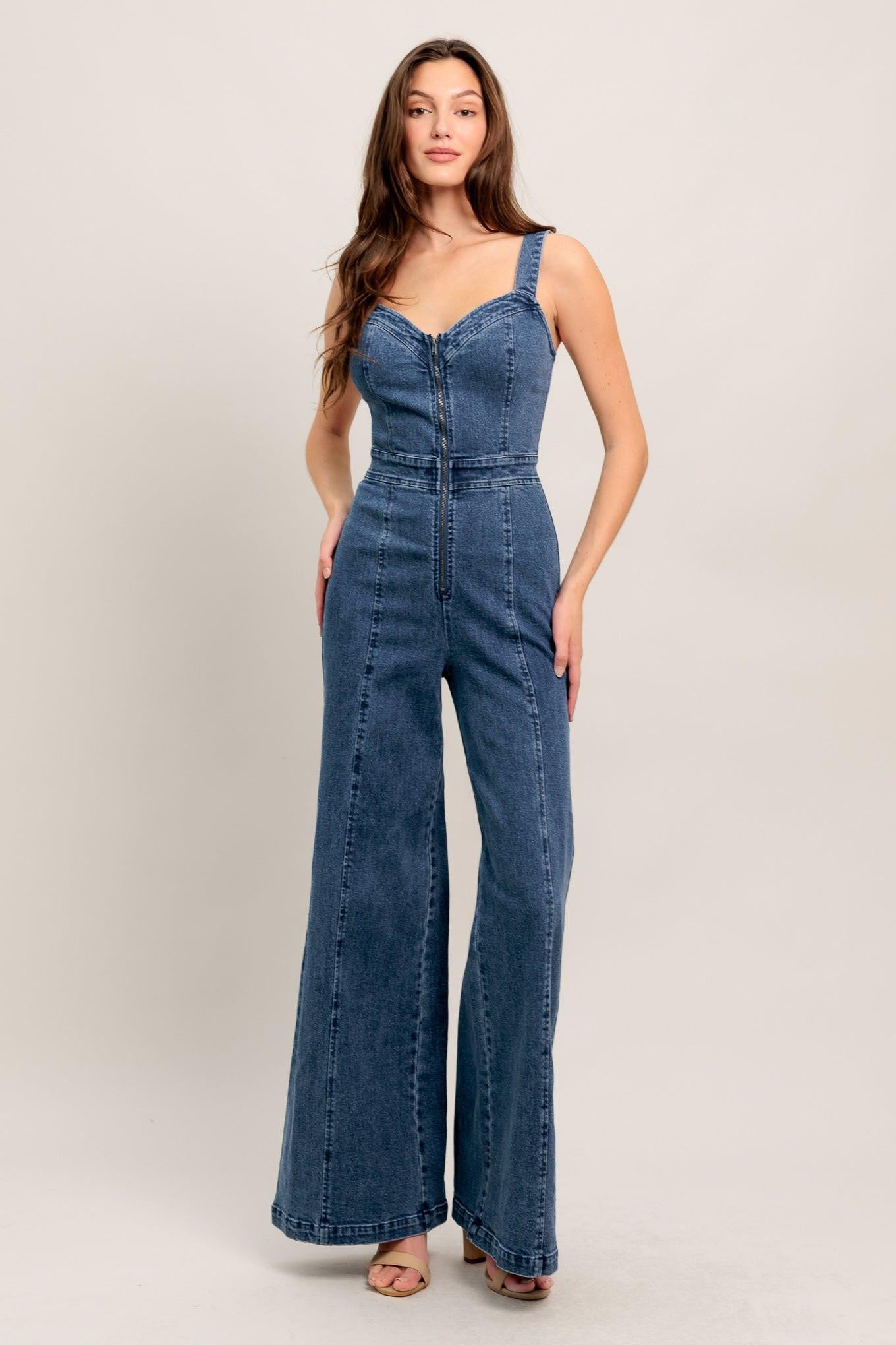 A washed denim jumpsuit featuring V neckline, straps and front zipper closure
Details:
Self : 99% Cotton 1% Spandex
Size & Fit
- Model is 5`8" And Wearing Size Small
- Measurements Taken From Size Small
- Approx. Length: 60" FLYING TOMATO