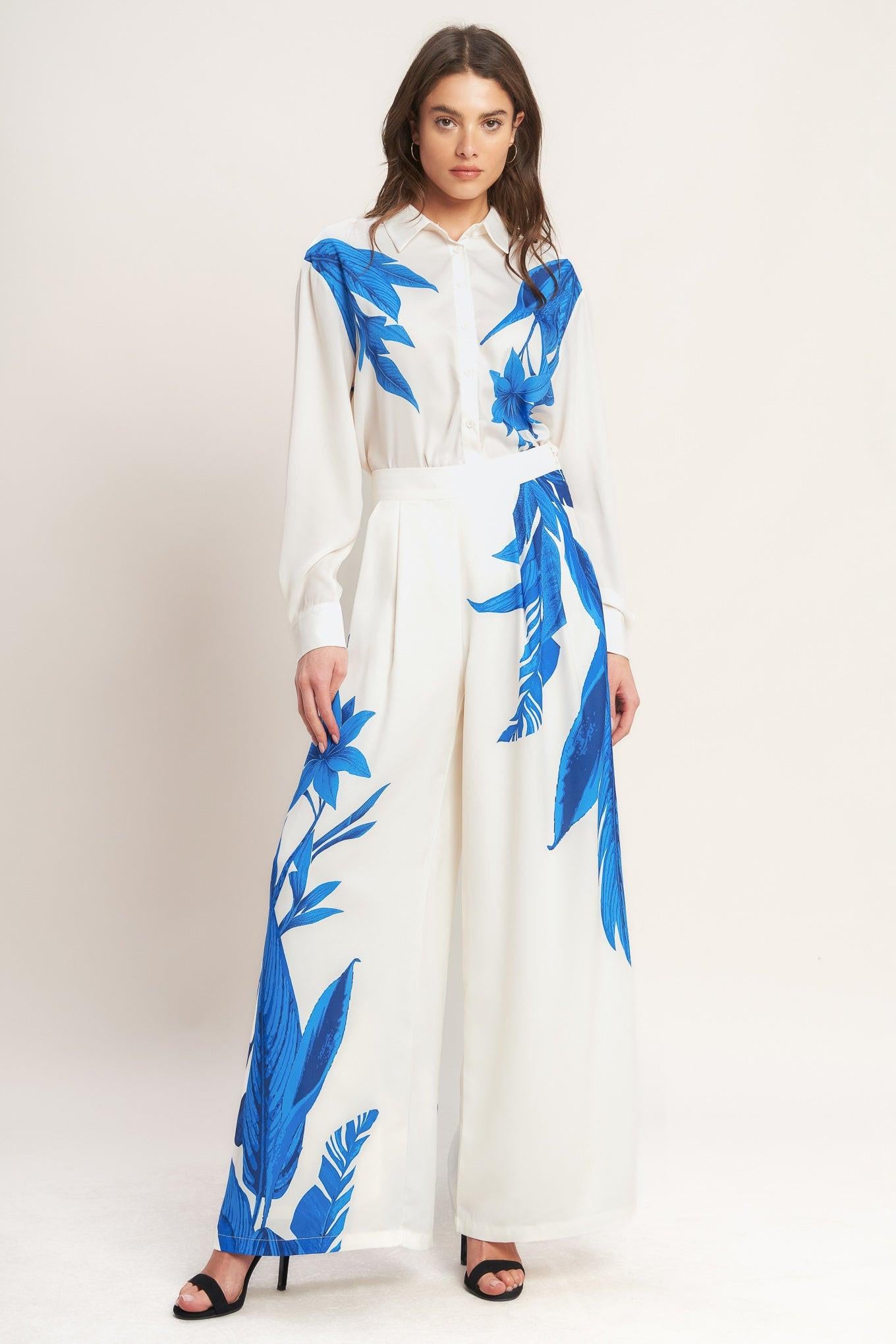 A printed woven pant with front pleat, wide leg and side zipper closure. Matching top IT14009B
Details:
Self : 100% Polyester
Lining : 100% Polyester
Size & Fit
- Model is 5`8" And Wearing Size Small
- Measurements Taken From Size Small
- Approx. Length: 44" Flying Tomato