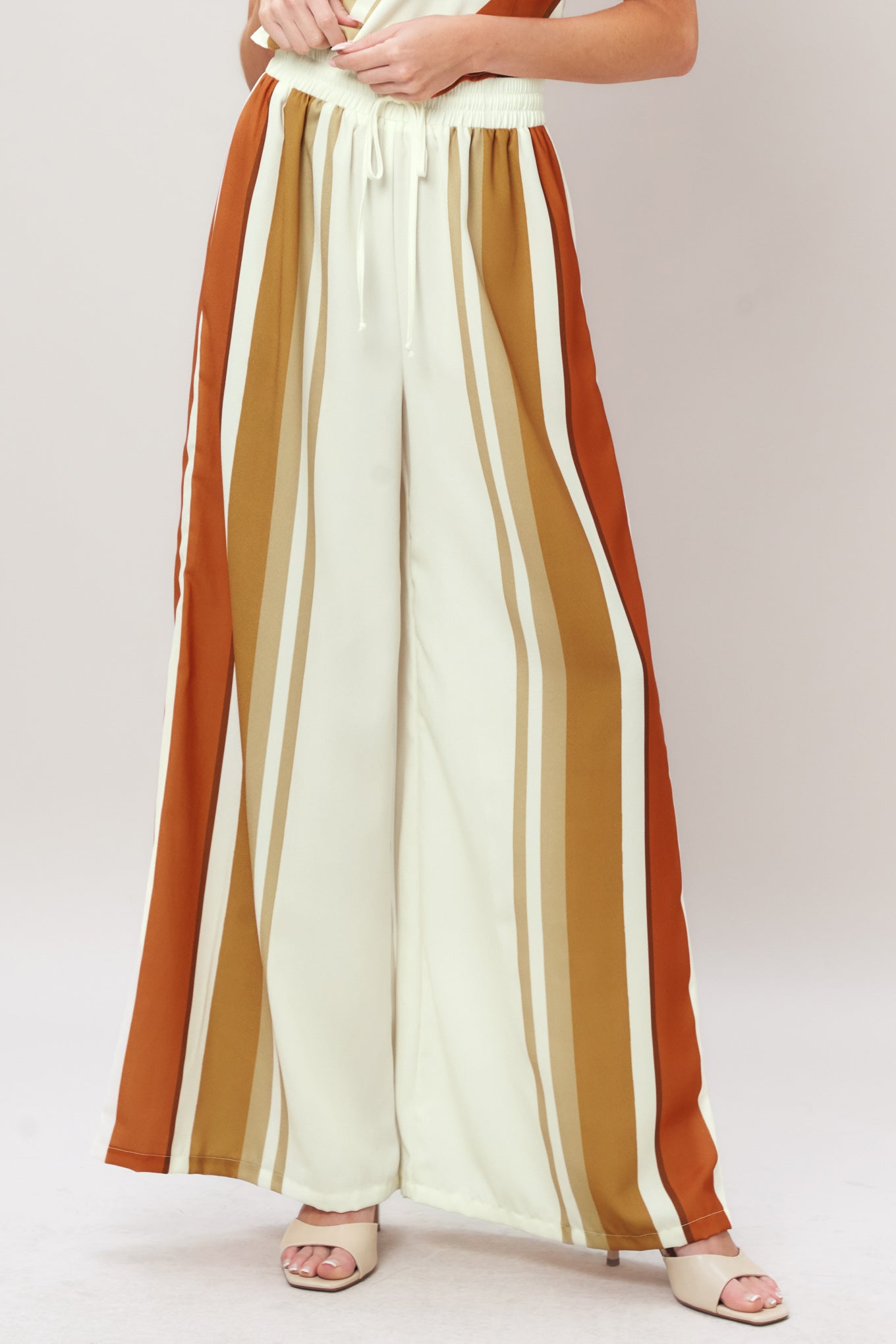 GOLDEN HORIZON WOVEN PANTS.