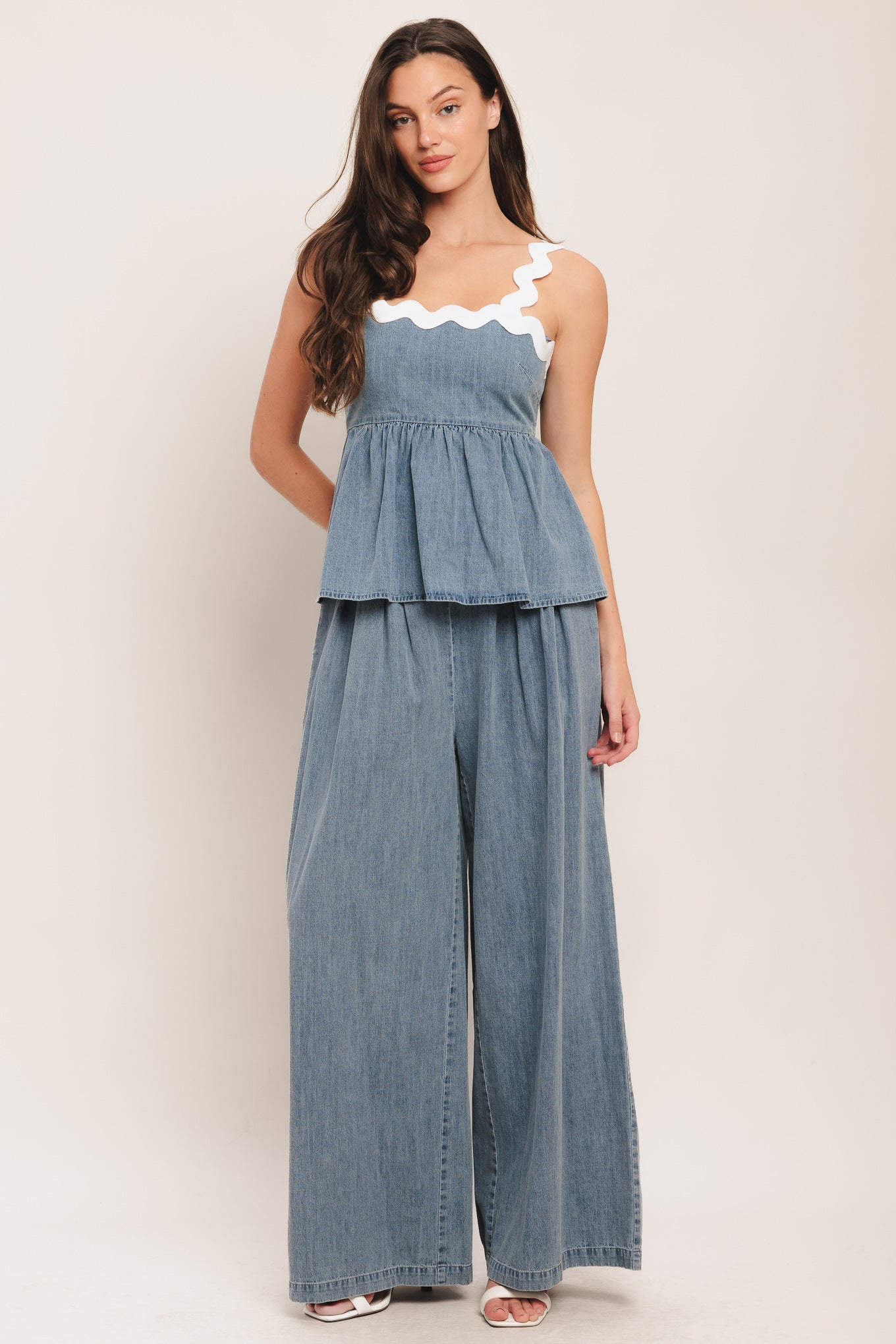 A lightweight washed denim pant with front pleats, wide leg and elasticized back waistband. Matching top IT14026B
Details:
Self: 100% Cotton
Contrast: 100% Cotton
Size & Fit
-Model is 5`8" And Wearing Size Small
-Measurements Taken From Size Small
-Approx. Length: 43"