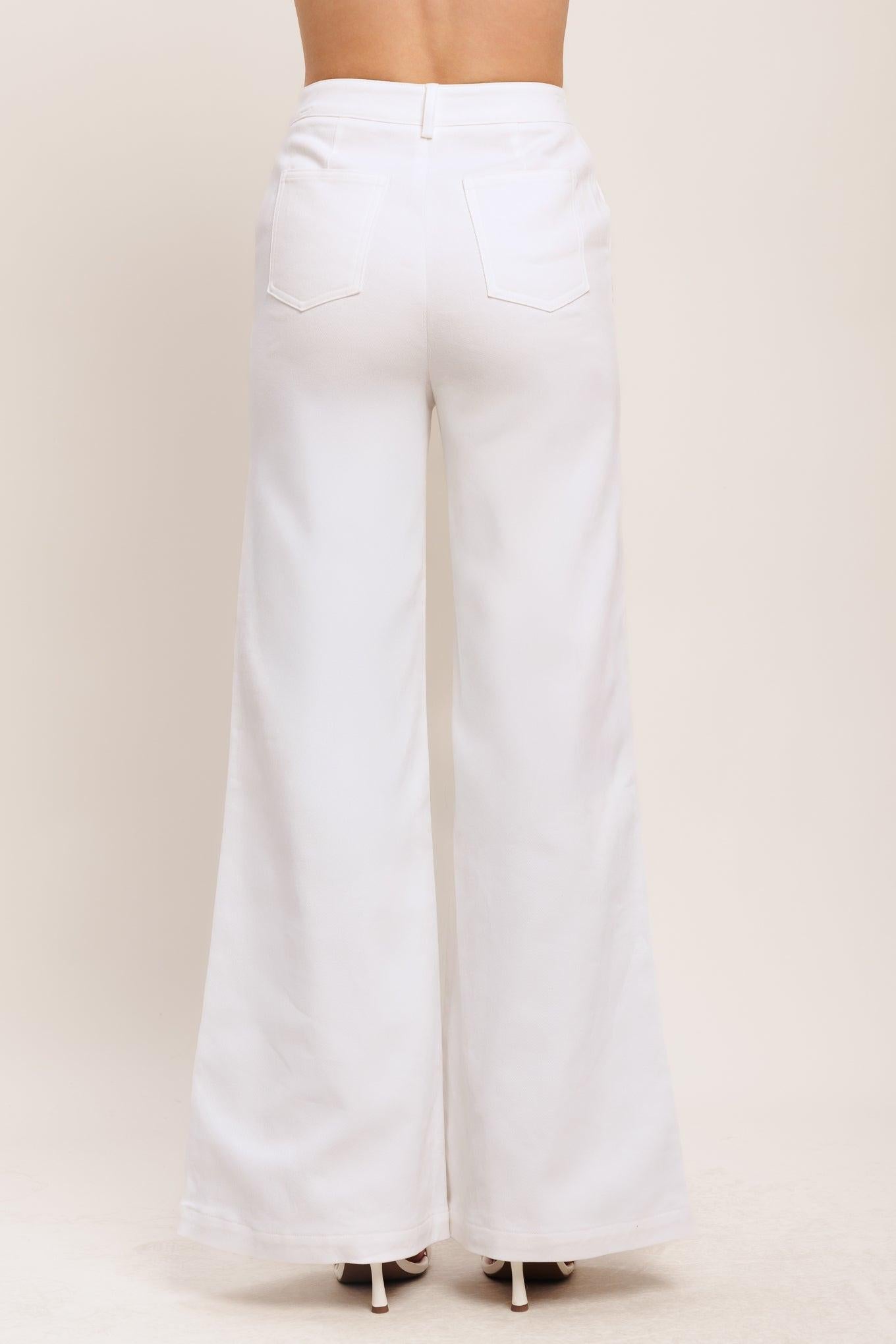 A solid woven pant featuring front closure, embroidery detail and wide leg
Details:
Self: 97% Cotton 3% Spandex
Size & Fit
-Model is 58 And Wearing Size Small
-Measurements Taken From Size Small
-Approx. Length: 44"