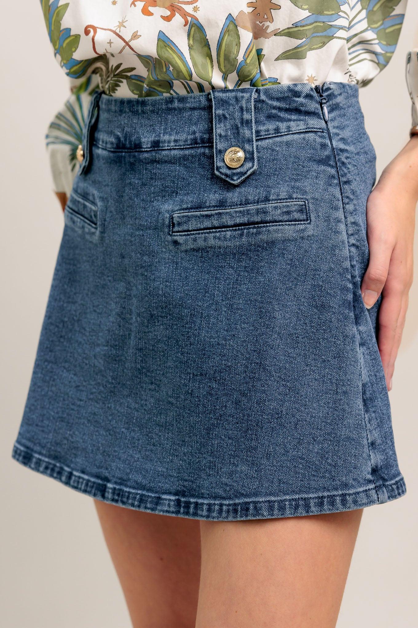 High-waisted washed denim mini skirt with a clean A-line shape and gold button details
Details:
Self: 99% Cotton 1% Spandex
Size & Fit
- Model is 5`8" And Wearing Size Small
- Measurements Taken From Size Small
- Approx. Length: 16"