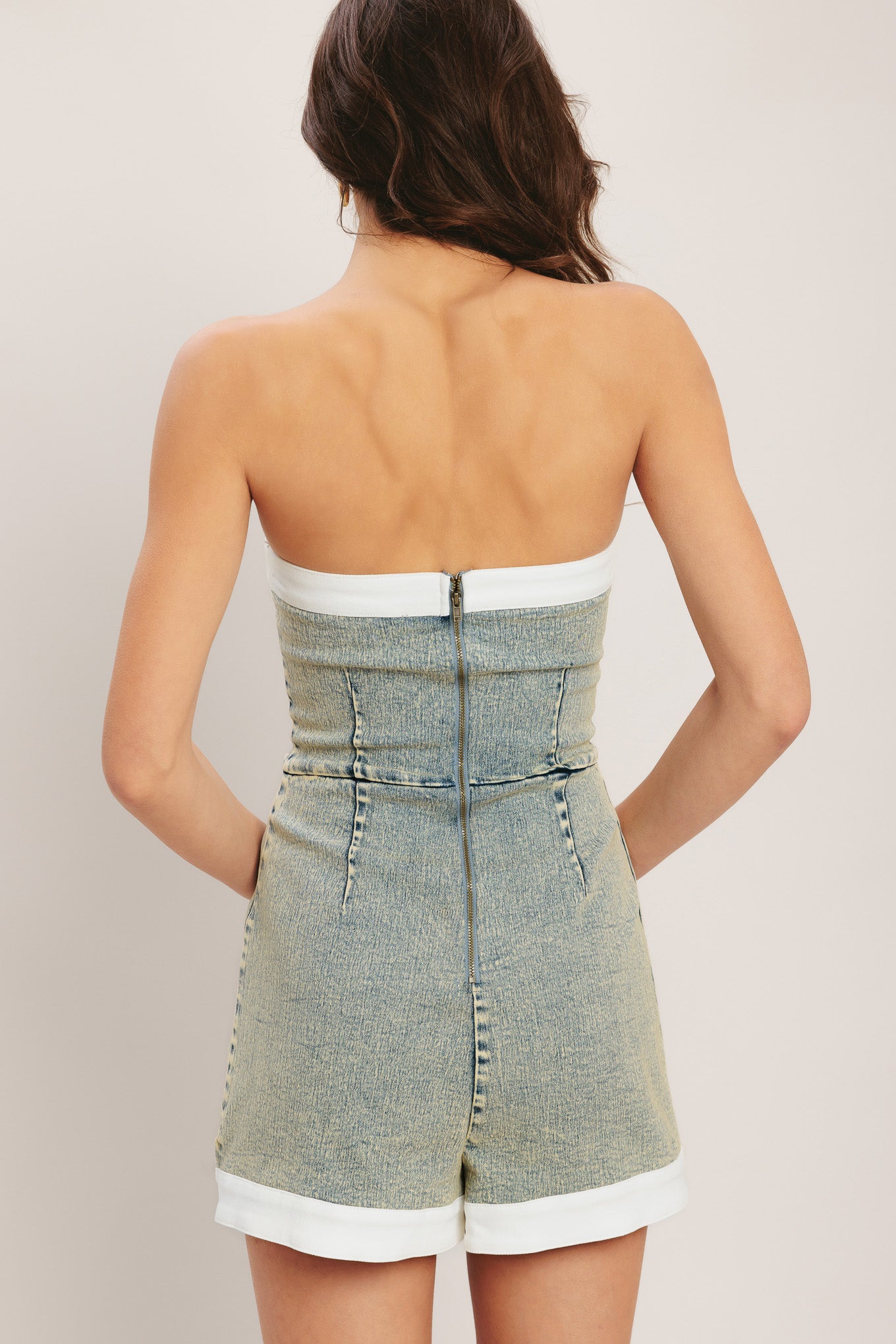 An acid washed skort romper featuring strapless, front butt down detail, contrasting band and back zipper closure
Details:
Self : 80% Cotton 15% Polyester 5% Spandex
Contrast : 97% Cotton 3% Spandex
Size & Fit
- Model is 5`8" And Wearing Size Small
- Measurements Taken From Size Small
- Approx. Length: 23"