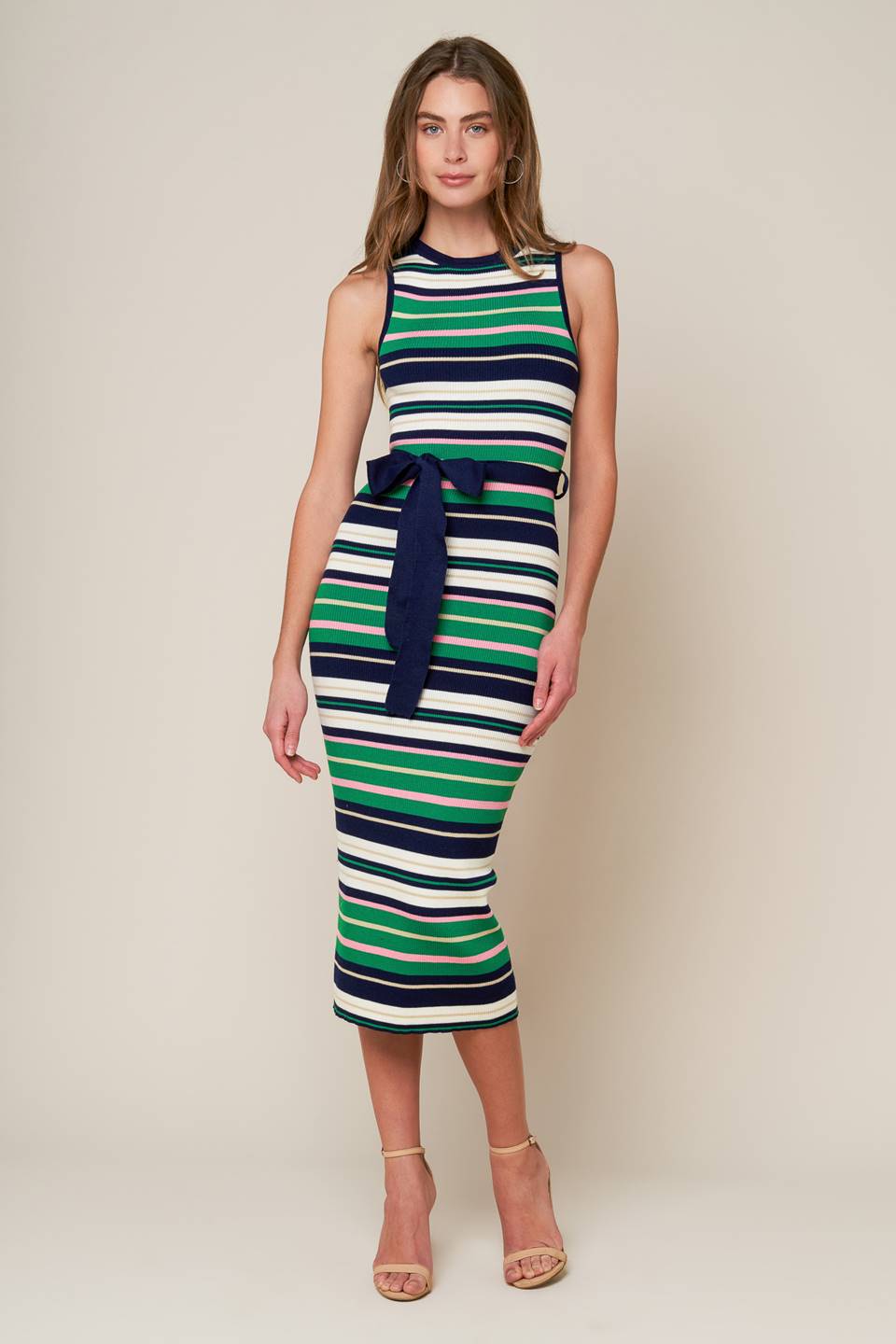 A luxurious sweater dress woven with ribbed fabric, adorned with a round neckline, sleeveless design, and a stylish self-tie detail.
Details:
Self : 100% Polyester
Size & Fit
- Model is 5`10" And Wearing Size Small
- Measurements Taken From Size Small
- Approx. Length: 48"