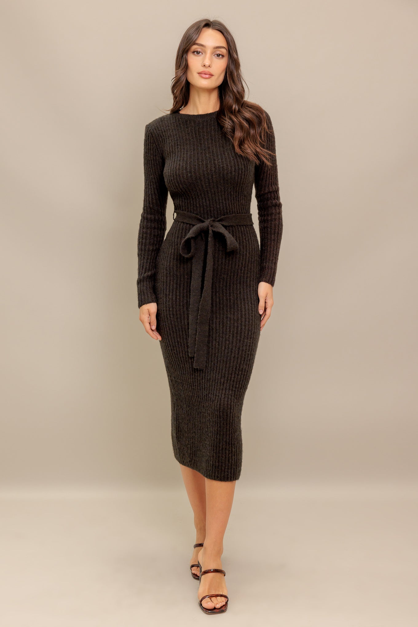 A sweater knit midi with long sleeve and self sash tie