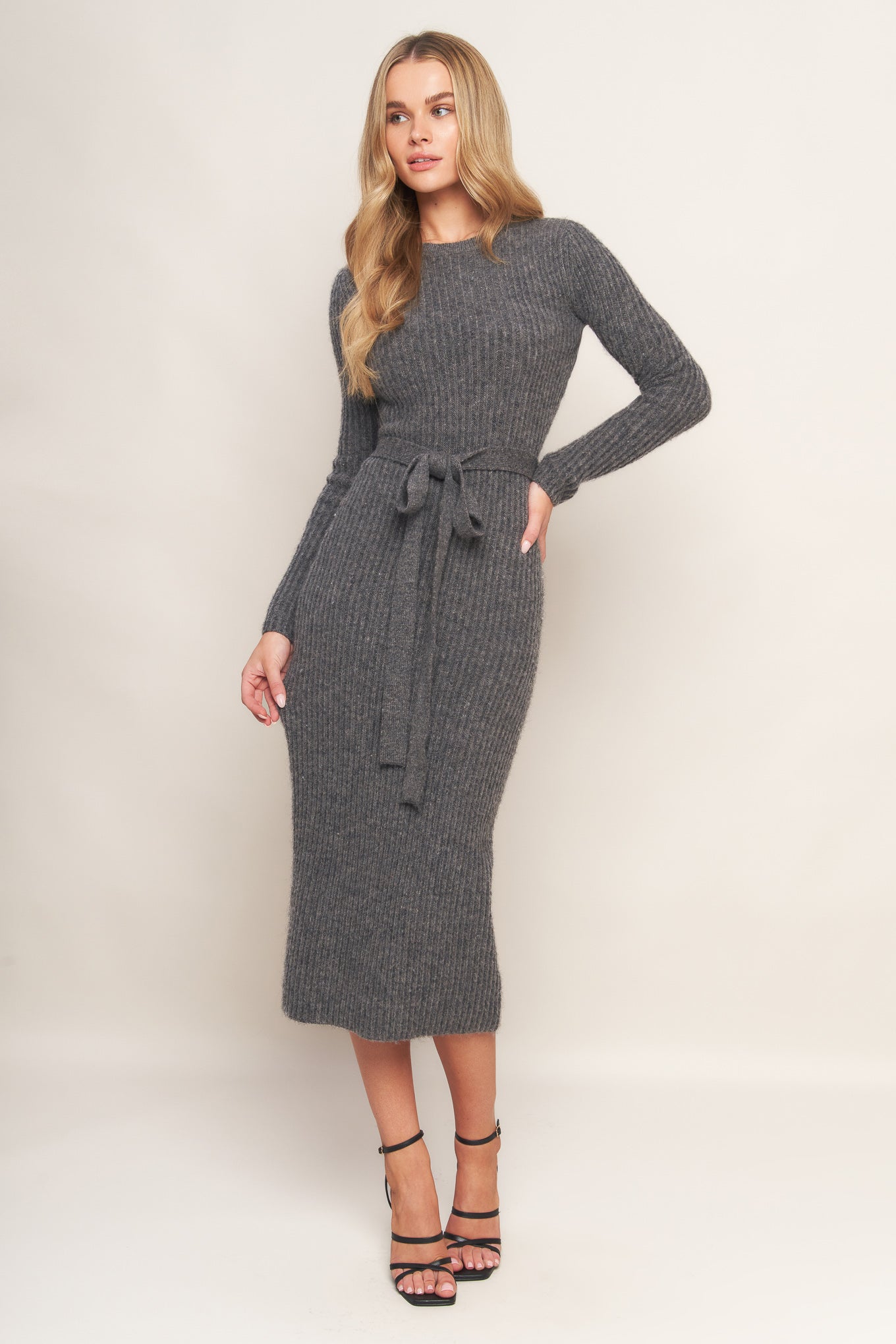 A sweater knit midi with long sleeve and self sash tie