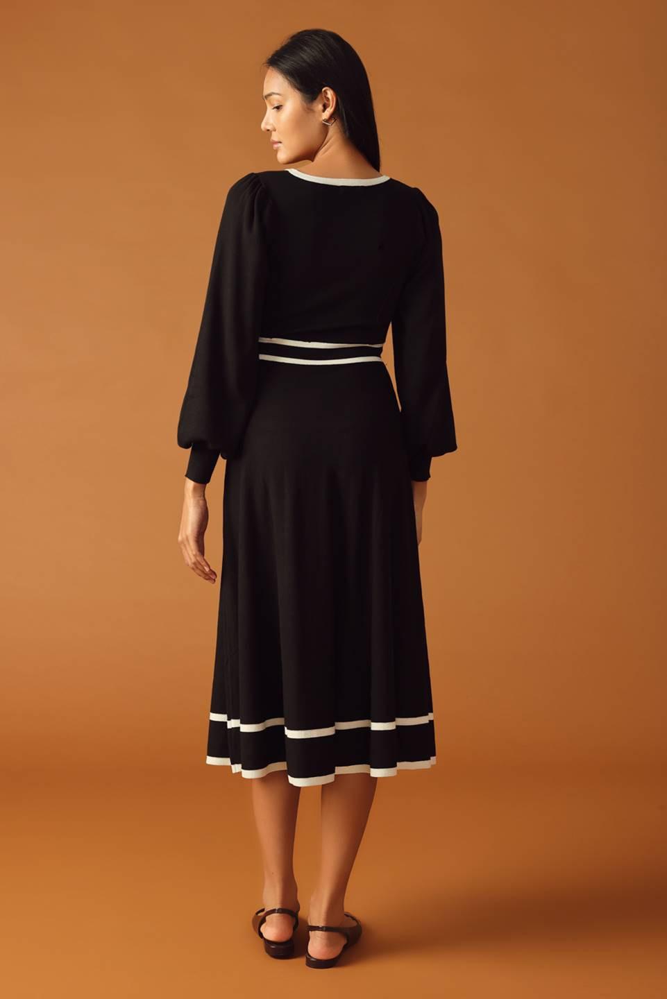 CAUGHT UP SWEATER MIDI DRESS.