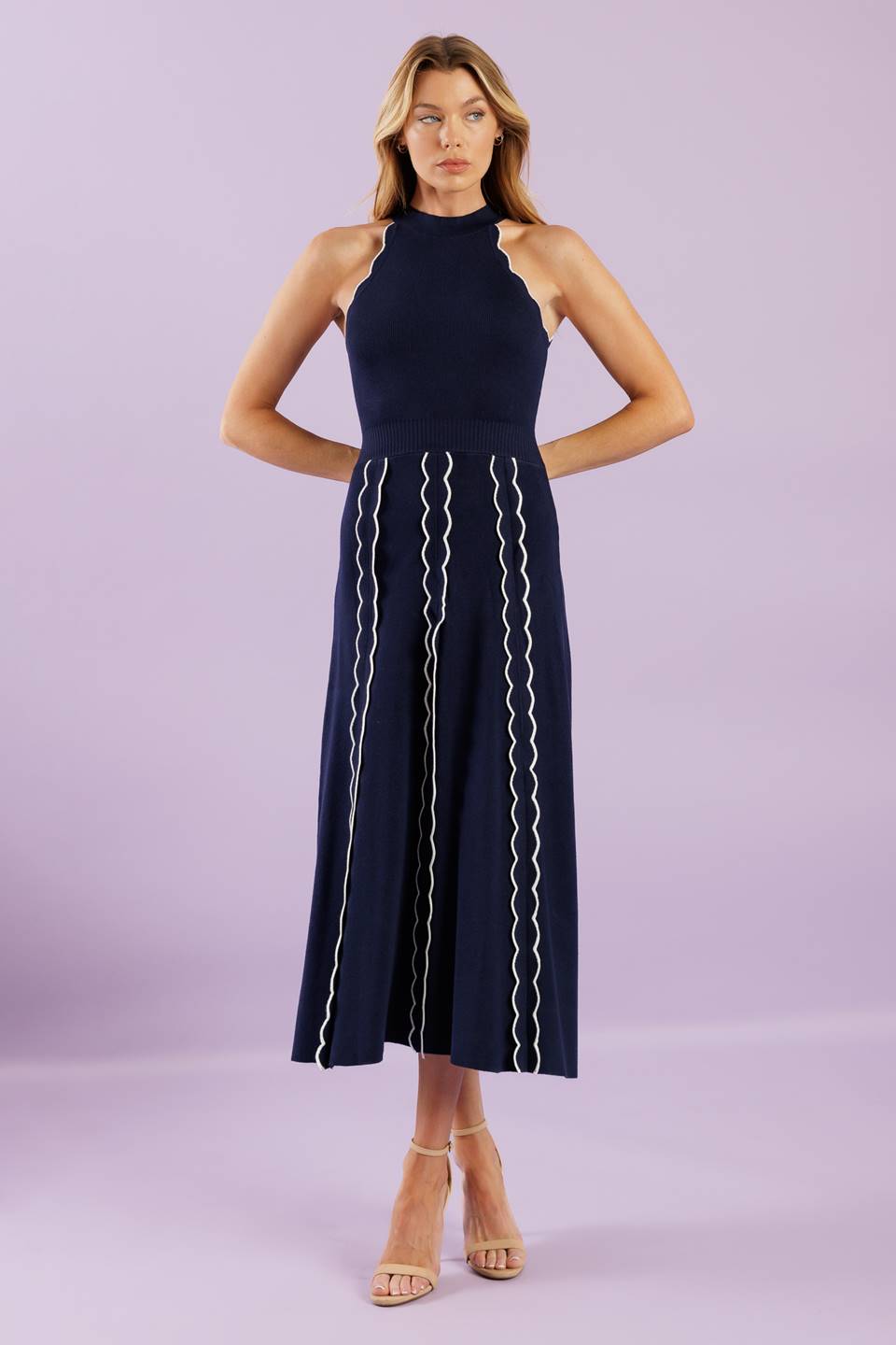 A solid sweater knit midi dress featuring halter neckline and back neck button closure
Details:
Self : 75% Viscose 25% Nylon
Size & Fit
- Model is 5`8" And Wearing Size Small
- Measurements Taken From Size Small
- Approx. Length: 55"