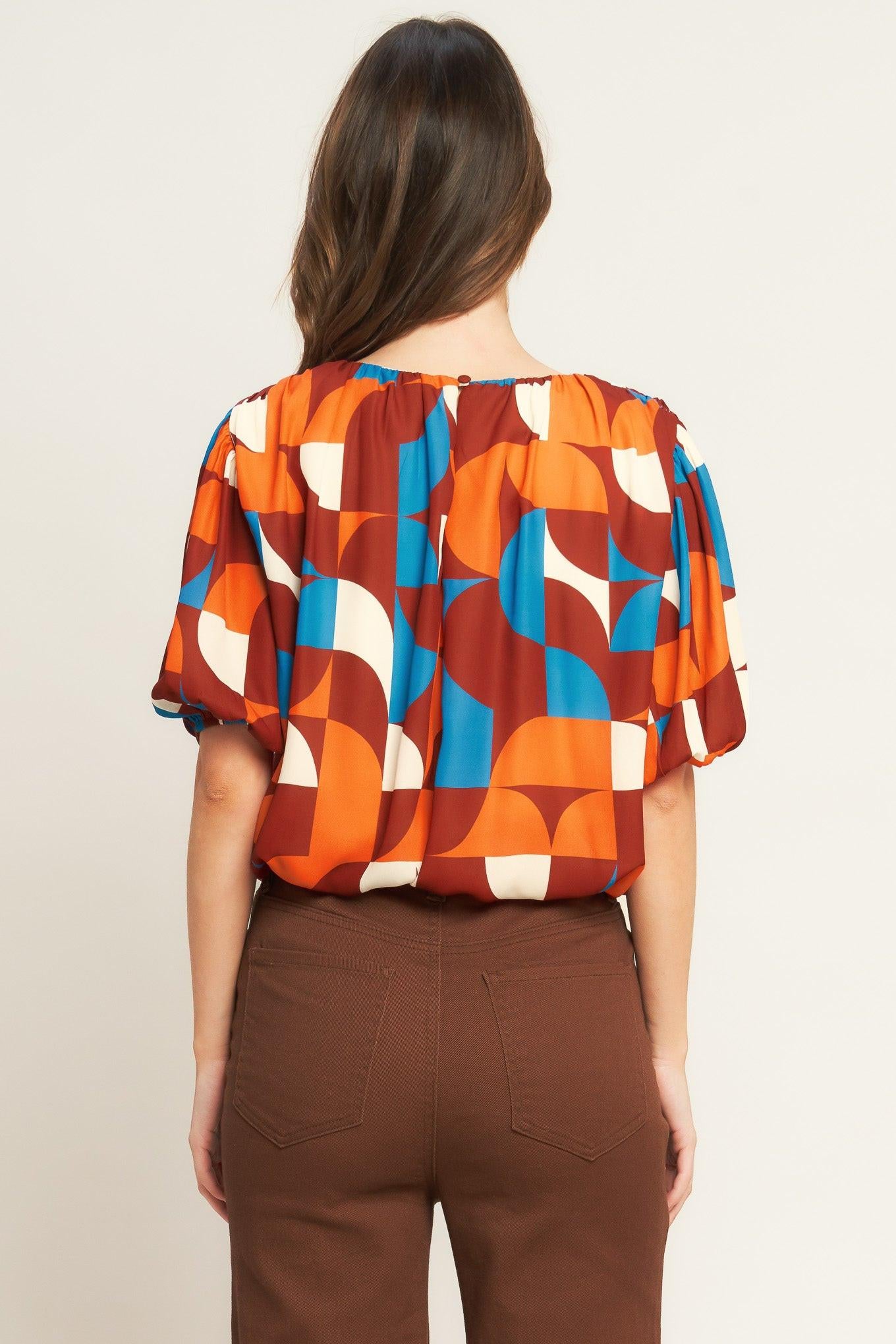 GONE IN A BLINK WOVEN TOP.