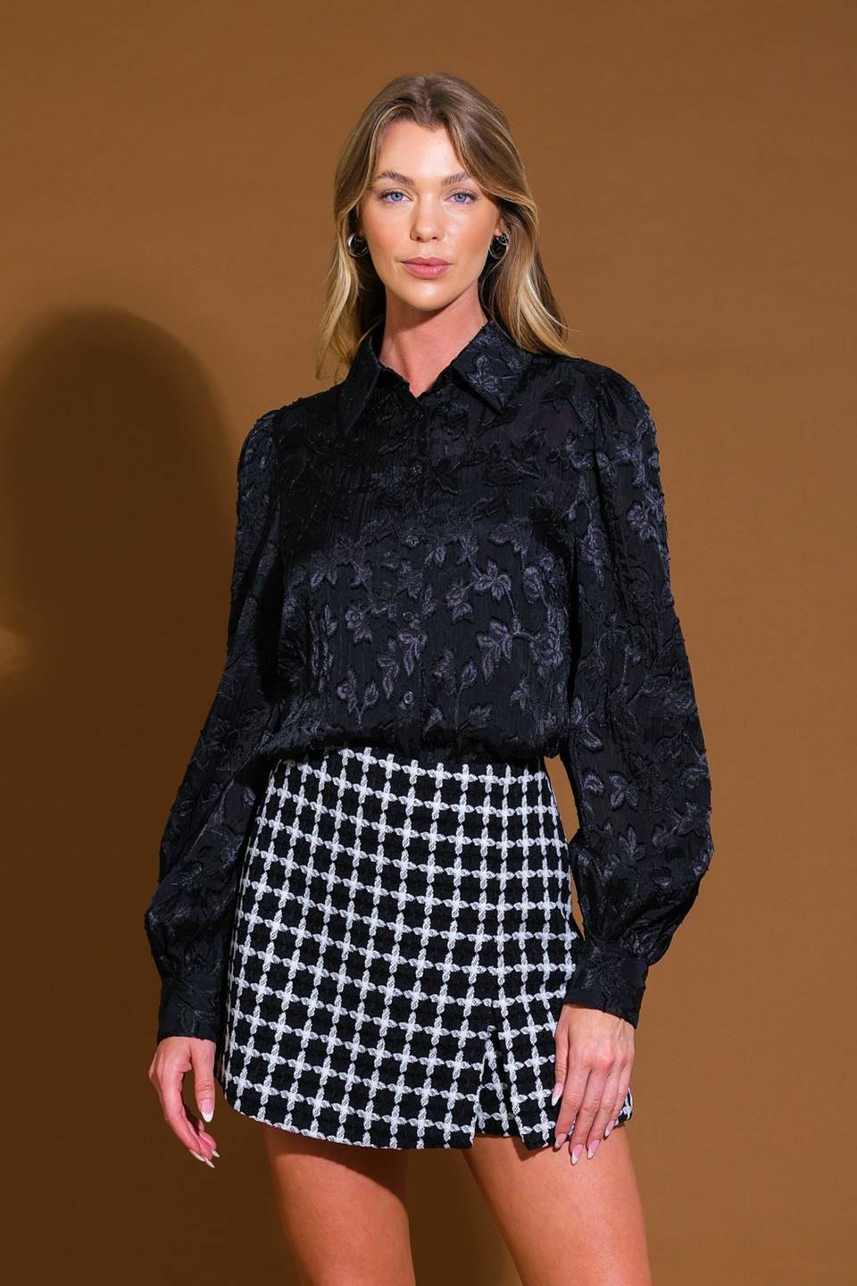 A jacquard woven top featuring shirt collar, button down, long sleeve and cami