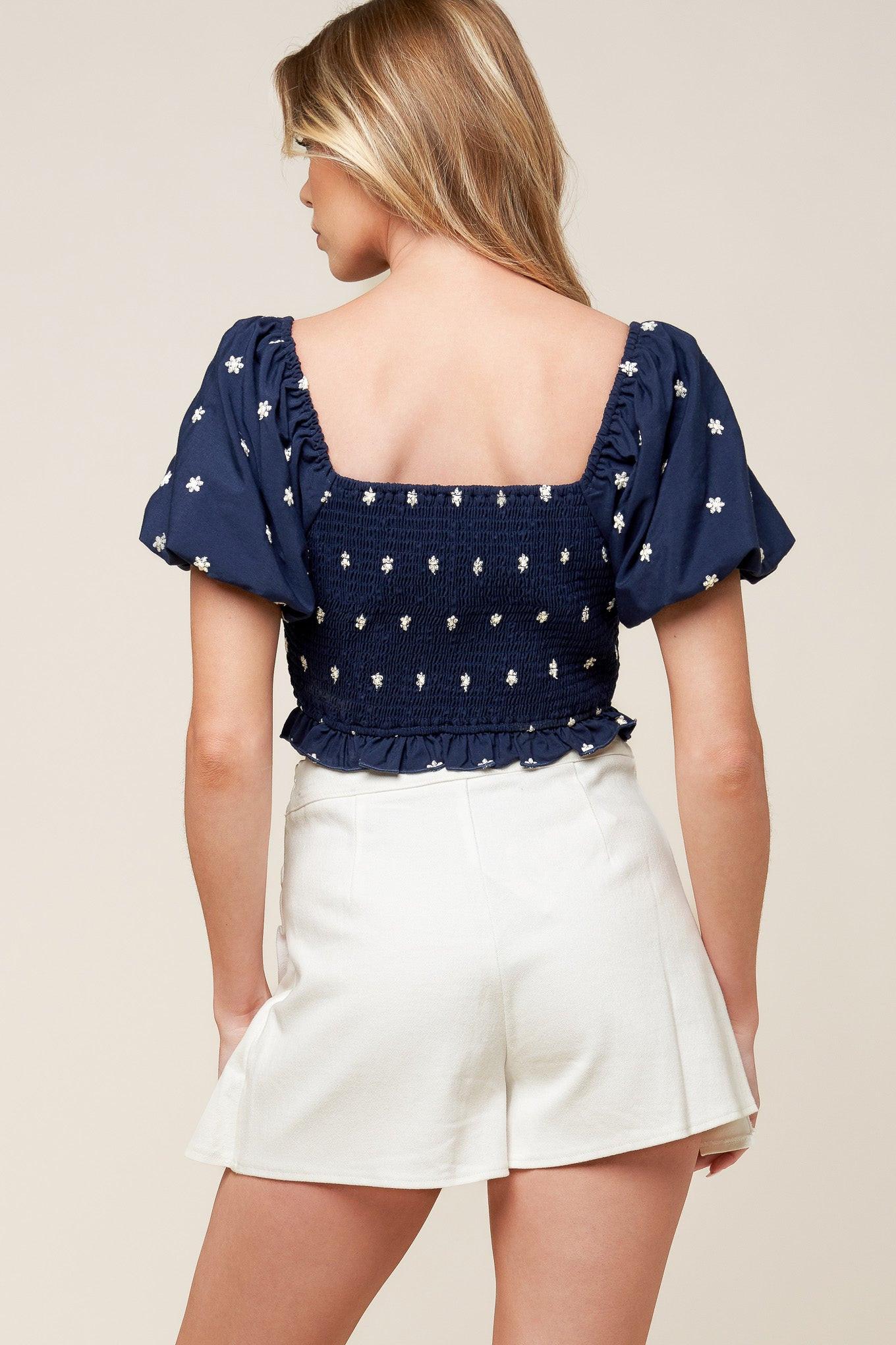 BEBE ALERT NAVY WOVEN TOP.