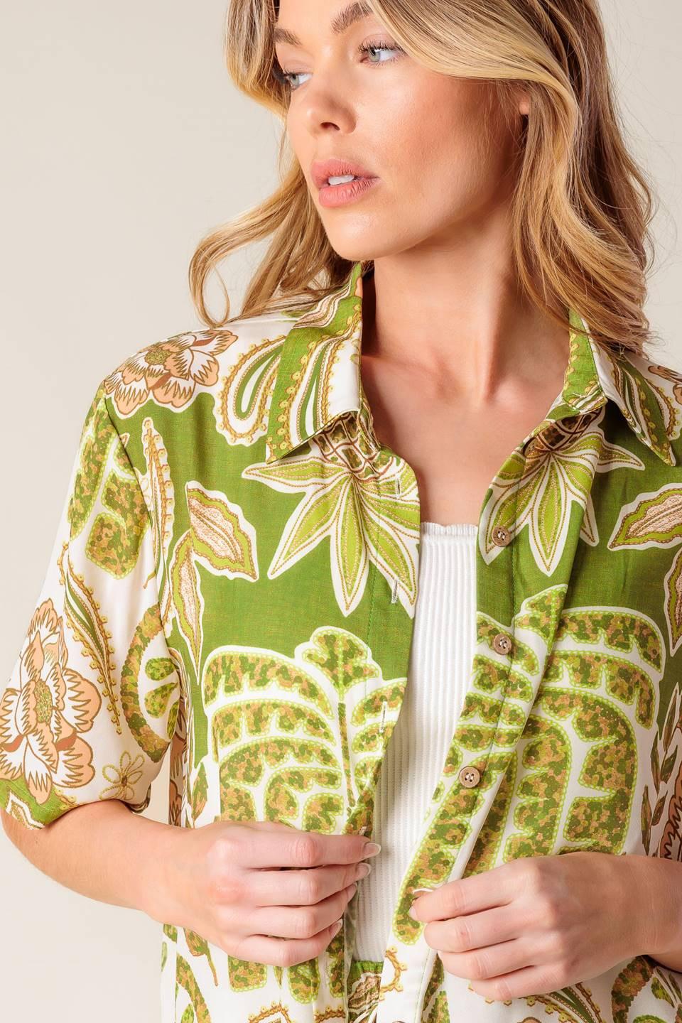 A printed woven shirt featuring collar, button down and short sleeve. Matching shorts IP8755
Details:
Self : 100% Polyester
Size & Fit
- Model is 5`8" And Wearing Size Small
- Measurements Taken From Size Small
- Approx. Length: 27"