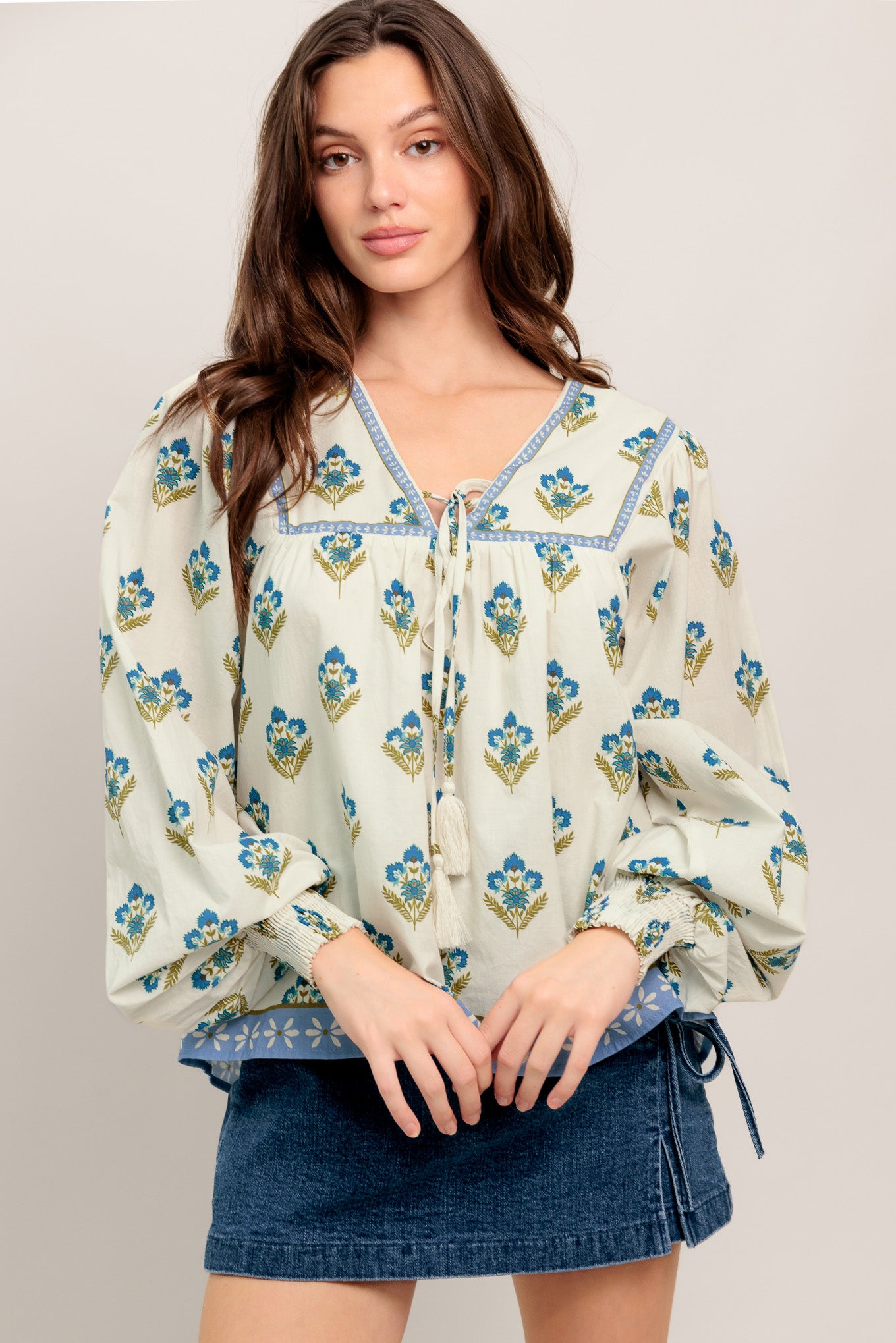 A printed woven top featuring V neckline with tie, yoke and long sleeve with smocked cuff
Details:
Self : 100% Cotton
Lining : 100% Polyester
Size & Fit
- Model is 5`8" And Wearing Size Small
- Measurements Taken From Size Small
- Approx. Length: 25" FLYING TOMATO