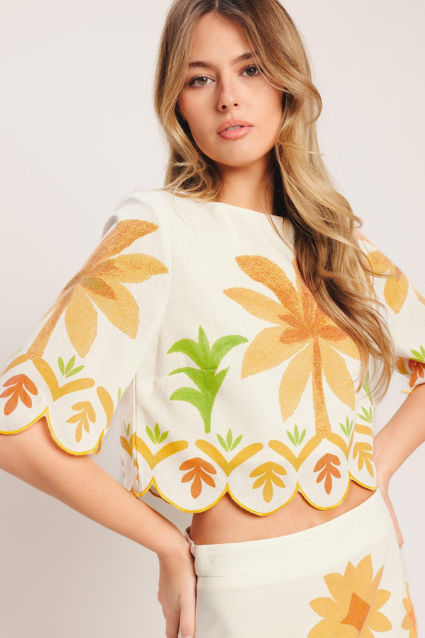 A printed woven crop top featuring round neckline, 3/4 sleeve with scalloped finish and back neck button closure
Details:
Self: 50% Cotton 20% Rayon 20% Polyester 10% Linen
Lining: 100% Polyester
Size & Fit
-Model is 5`8" And Wearing Size Small
-Measurements Taken From Size Small
-Approx. Length: 18"