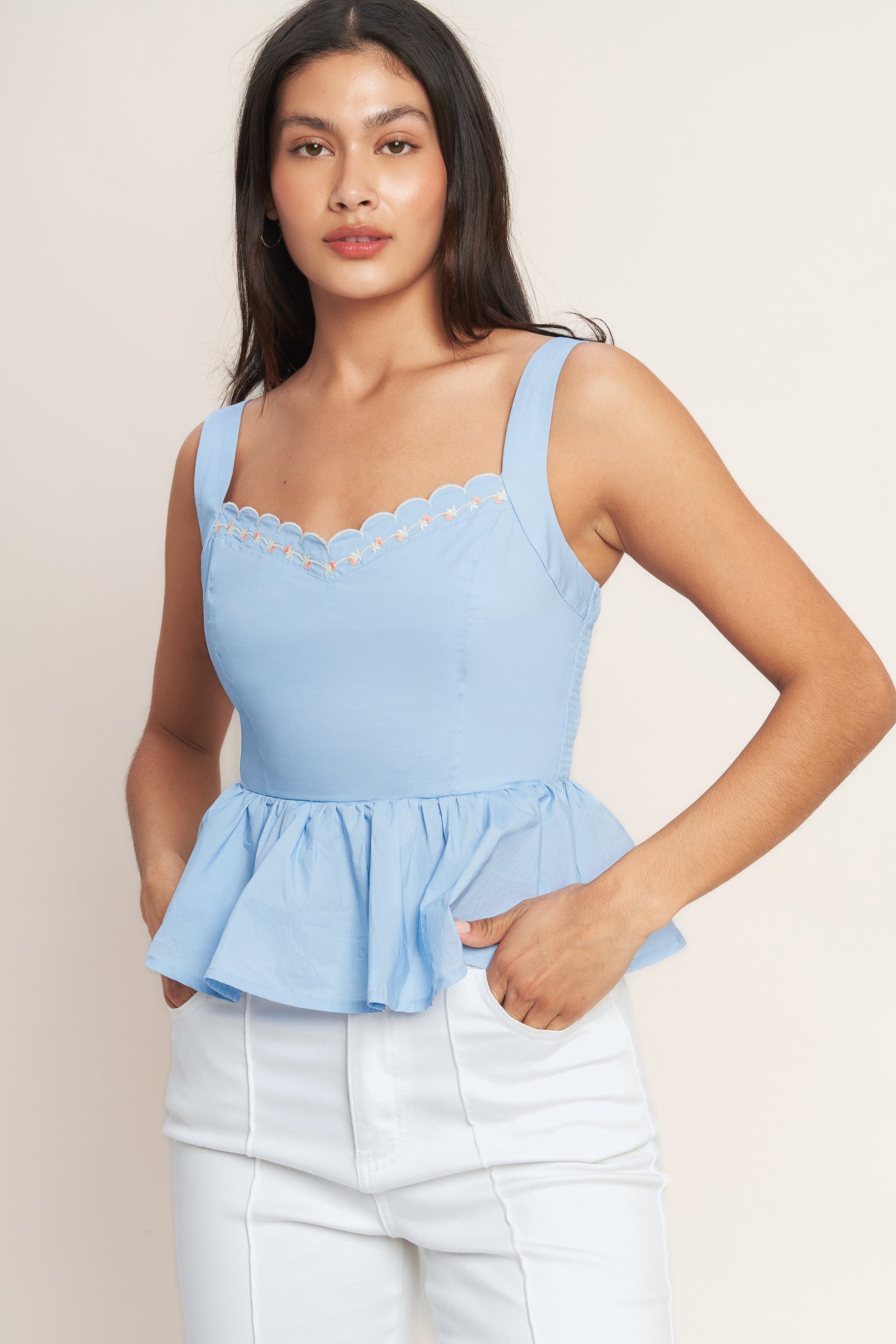 A solid woven top featuring V neckline with scallop edge and embroidery, peplum and smocked back bodice. Matching skirt IK7770T
Details:
Self : 100% Cotton
Lining : 100% Polyester
Size & Fit
- Model is 5`8" And Wearing Size Small
- Measurements Taken From Size Small
- Approx. Length: 21"