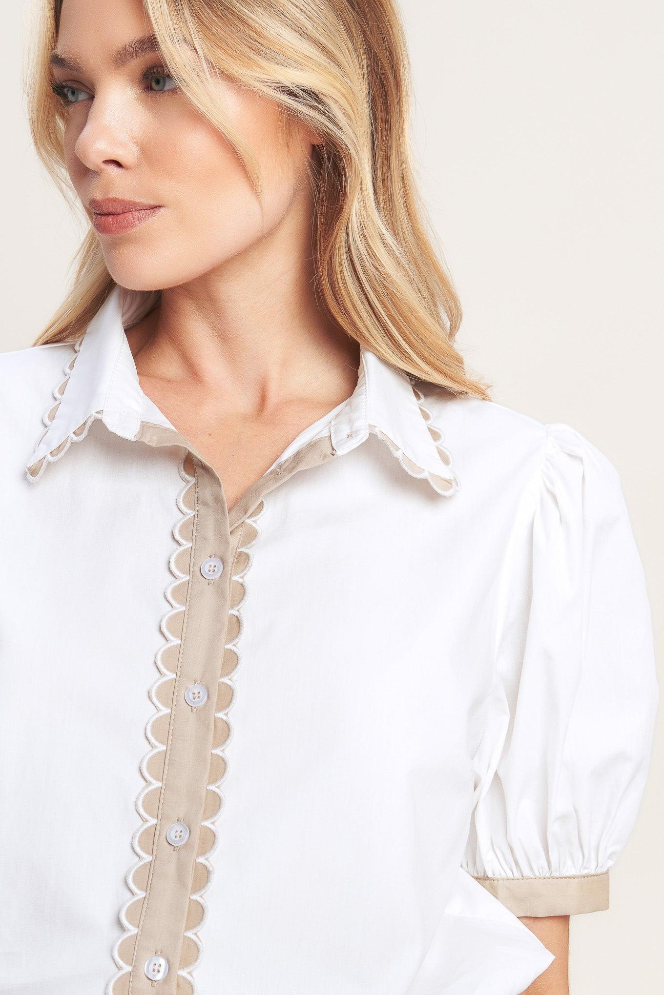 A solid woven top featuring scallop edge collar, short puff sleeve, button down with scallop edge placket
Details:
Self: 100% Cotton
Contrast: 100% Cotton
Size & Fit
-Model is 5`8" And Wearing Size Small
-Measurements Taken From Size Small
-Approx. Length: 25"