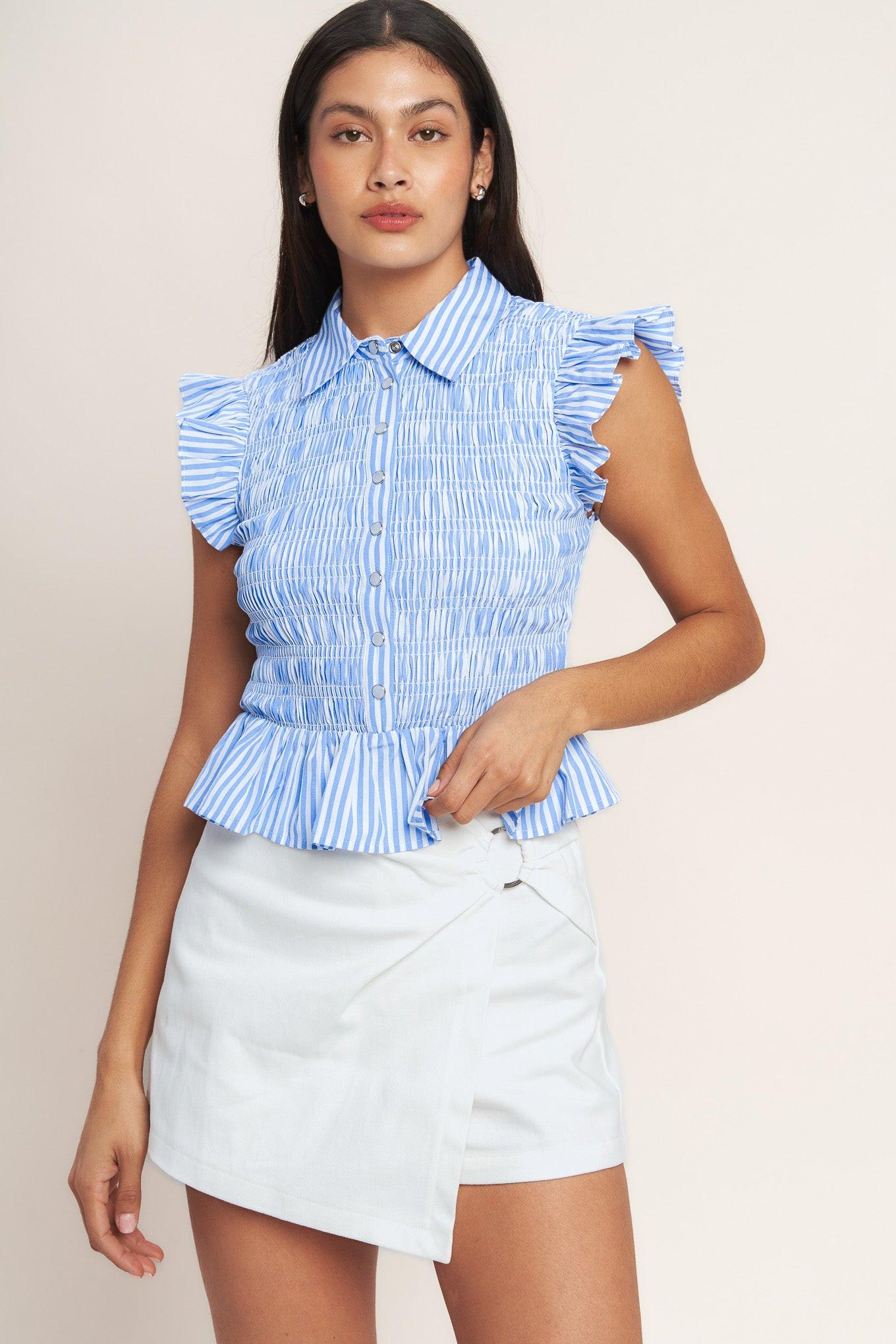 A striped woven top featuring collar, ruffle sleeve, button down, smocked bodice and peplum
Details:
Self : 60% Cotton 40% Polyester
Size & Fit
- Model is 5`8" And Wearing Size Small
- Measurements Taken From Size Small
- Approx. Length: 20" Flying Tomato