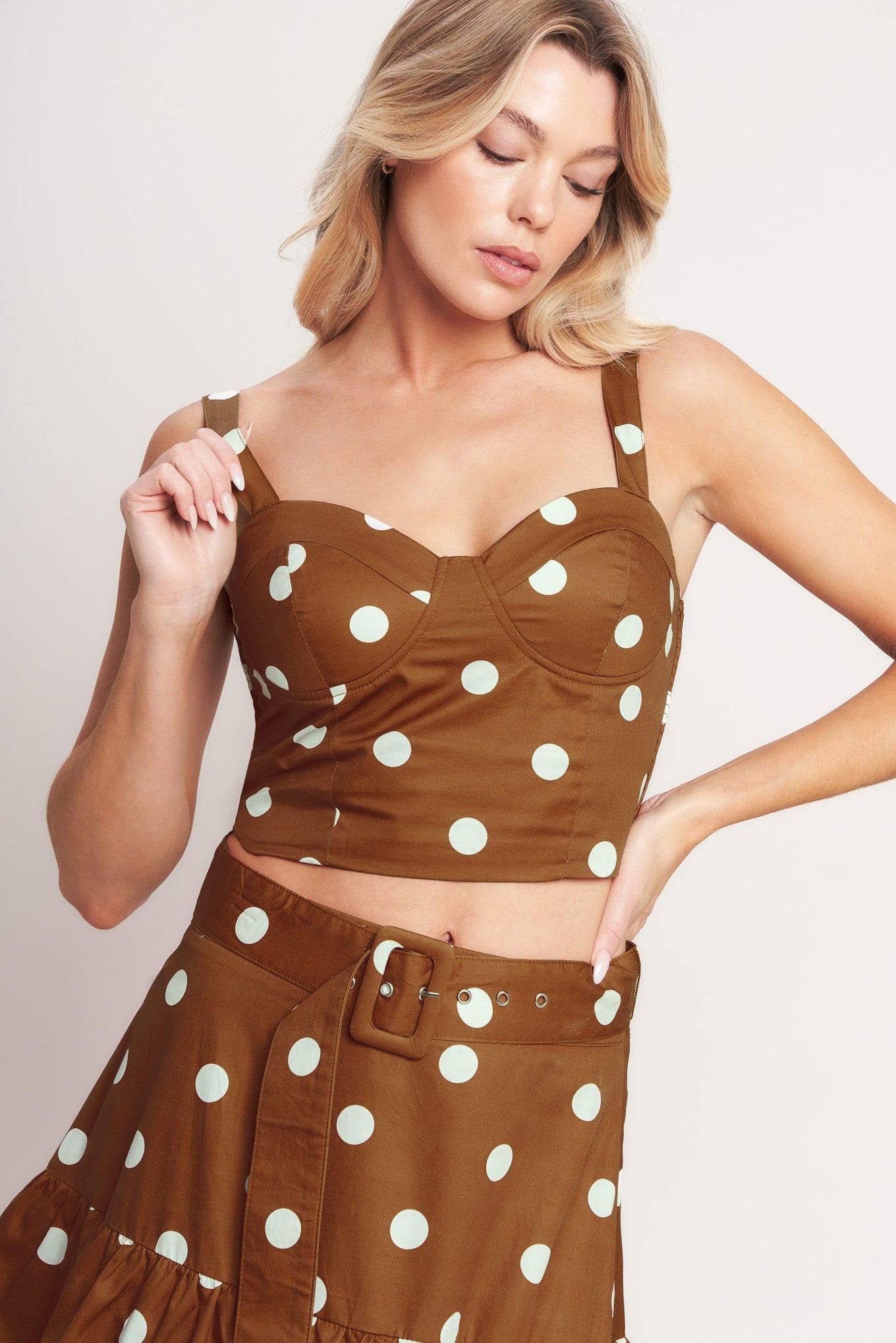 A printed woven bustier top and smocked back bodice. Matching skirt IK7778T
Details:
Self : 100% Cotton
Lining : 100% Polyester
Size & Fit
- Model is 5`8" And Wearing Size Small
- Measurements Taken From Size Small
- Approx. Length: 16"