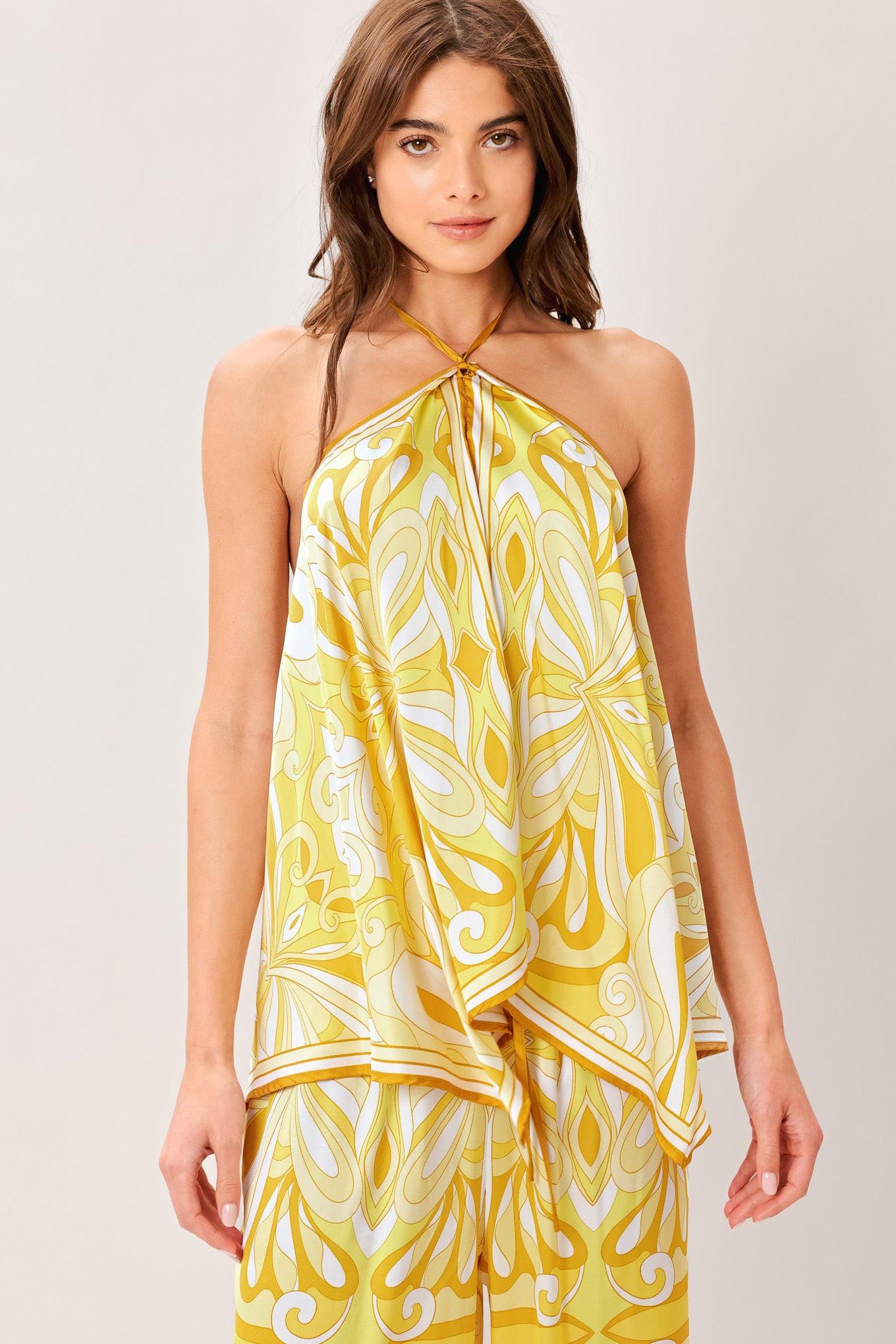 A printed woven hanky top with halter tie