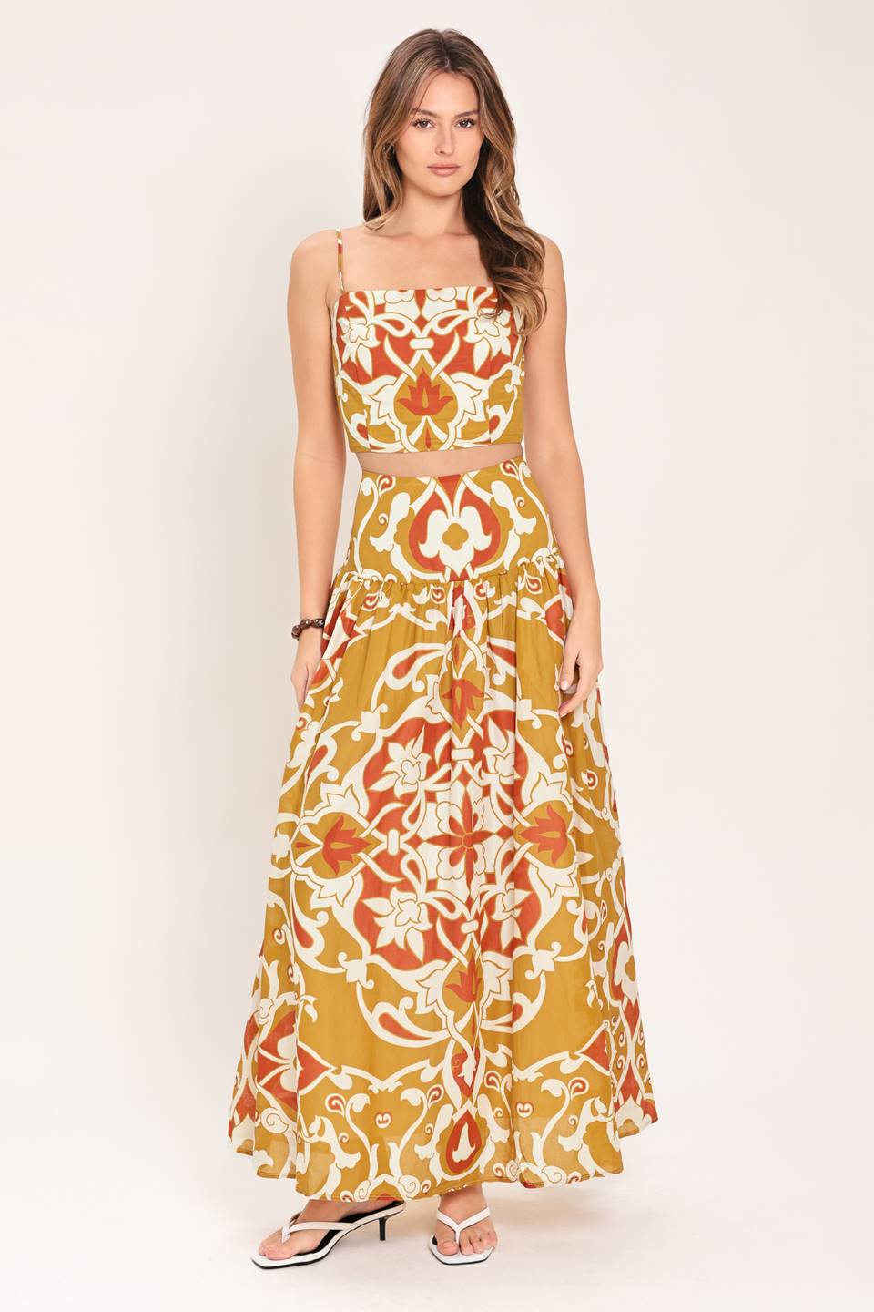 Woman wearing a camel multicolor printed two-piece top and skirt set | Flying Tomato