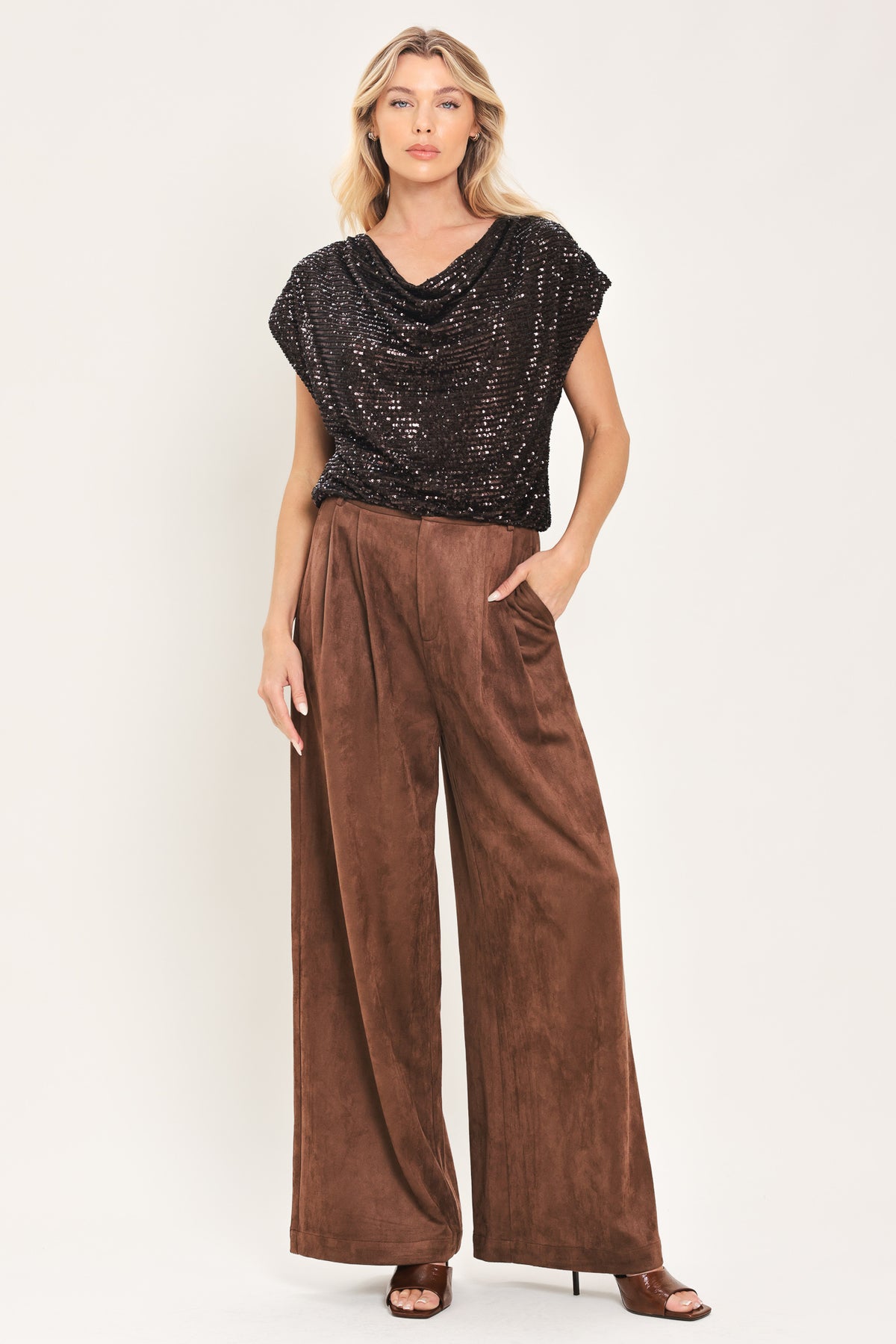 Woman wearing a cropped dark brown sequins top with a cowl neckline and overall slouchy look | Flying Tomato