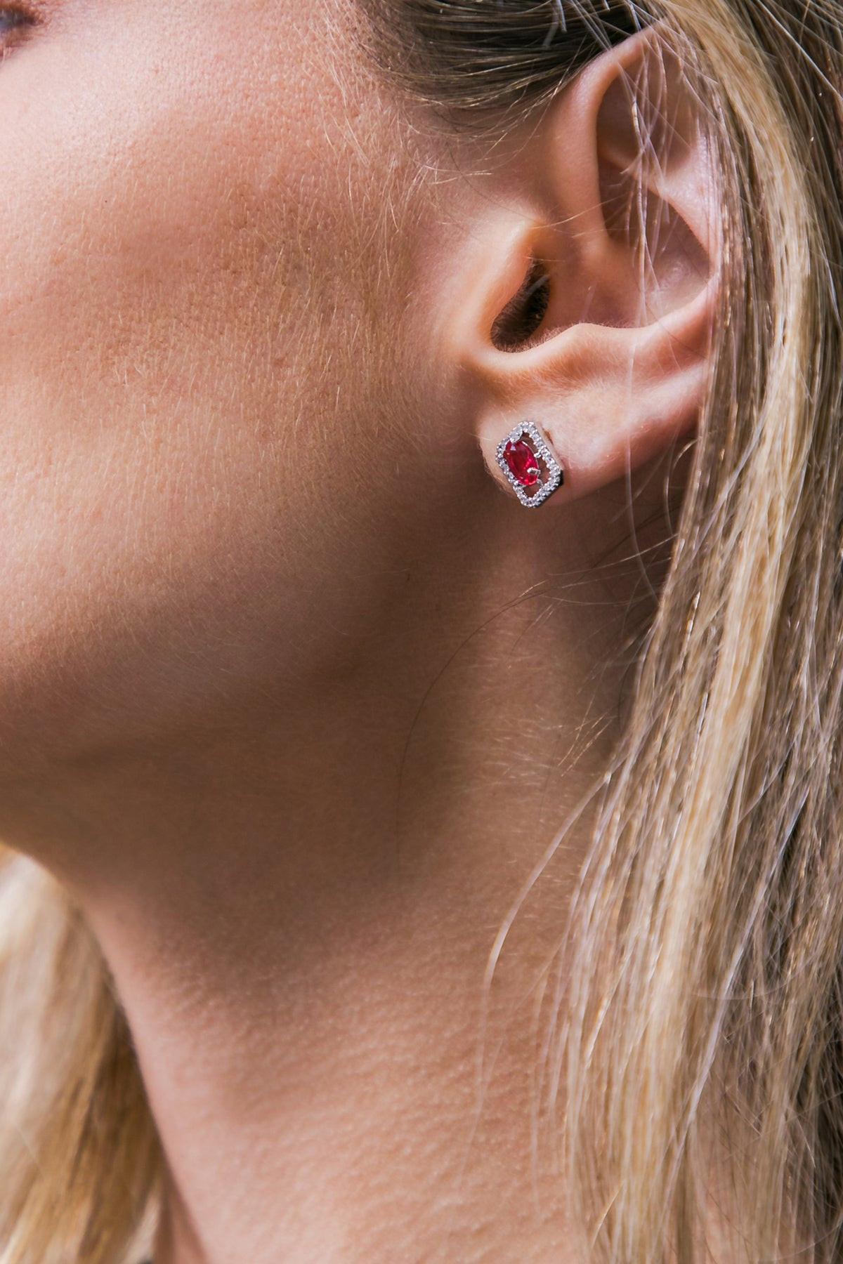 HALO ZIRCONIA ROUND EARRINGS.