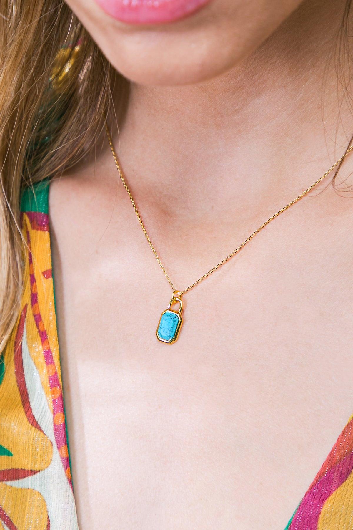 TURQUOISE SLICE PENDANT NECKLACE.