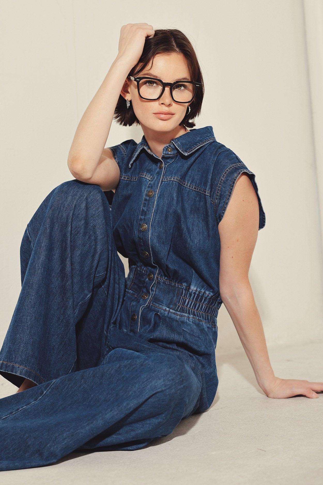 POWER PLAY DENIM JUMPSUIT.