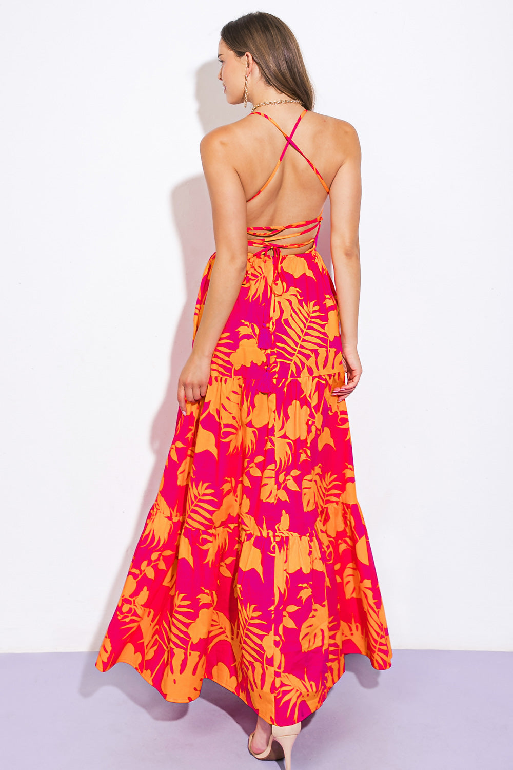 A printed woven maxi dress featuring straight neckline, halter strap, tiered skirt and bare back with strap tie closure
Details:
Self : 100% Cotton
Lining : 100% Polyester
Size & Fit
- Model is 5`8" And Wearing Size Small
- Measurements Taken From Size Small
- Approx. Length: 58"