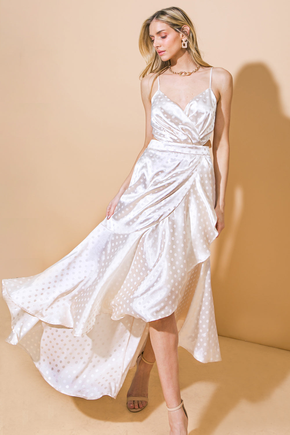 A solid woven midi dress featuring surplice neckline, straps, faux wrap with ruffled hemline, back and with tie and zipper closure
Details:
Self : 97% Polyester 3% Spandex
Lining : 100% Polyester
Size & Fit
- Model is 5`8" And Wearing Size Small
- Measurements Taken From Size Small
- Approx. Length: 61"