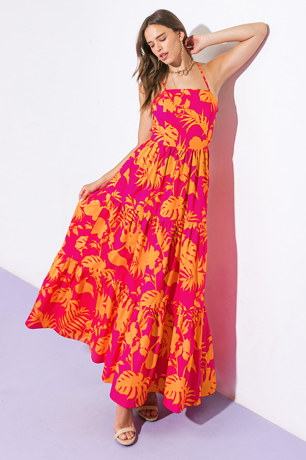 A printed woven maxi dress featuring straight neckline, halter strap, tiered skirt and bare back with strap tie closure
Details:
Self : 100% Cotton
Lining : 100% Polyester
Size & Fit
- Model is 5`8" And Wearing Size Small
- Measurements Taken From Size Small
- Approx. Length: 58"