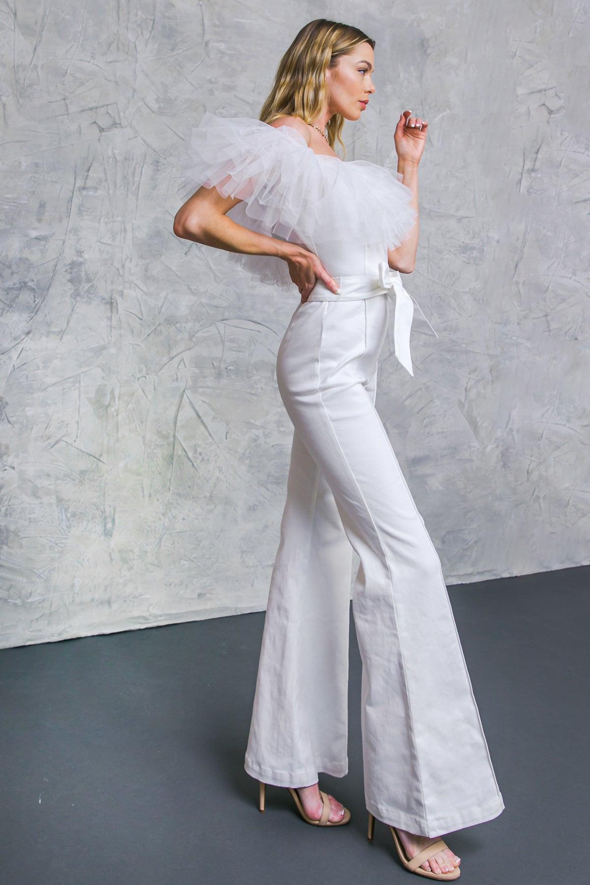 A POWER MOOD WHITE DENIM JUMPSUIT.