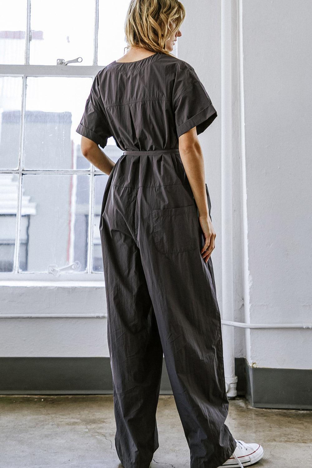 SAY IT AGAIN WOVEN JUMPSUIT.