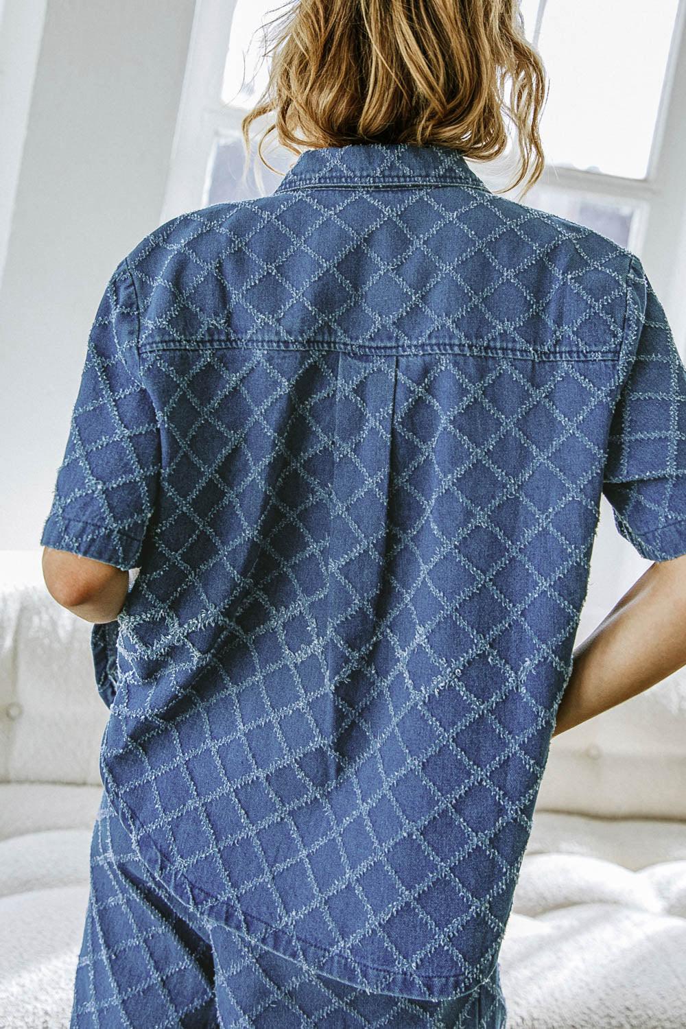 IT'S A SECRET DENIM TOP.