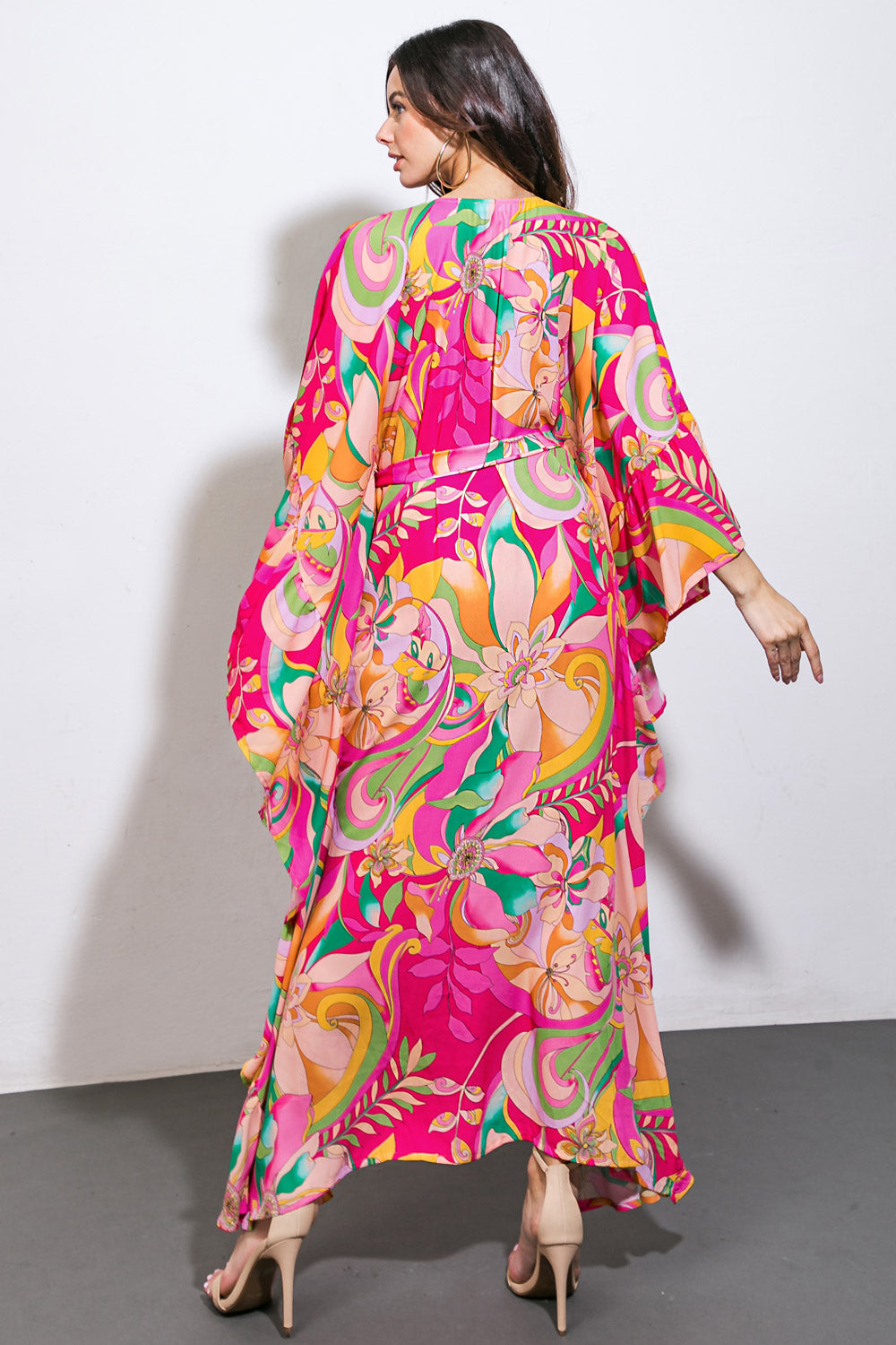 A printed woven kaftan dress featuring V neckline, ruffled winged sleeve and self sash tie
Details:
Self : 100% Polyester
Size & Fit
- Model is 5`7" And Wearing Size Small
- Measurements Taken From Size Small
- Approx. Length: 58"