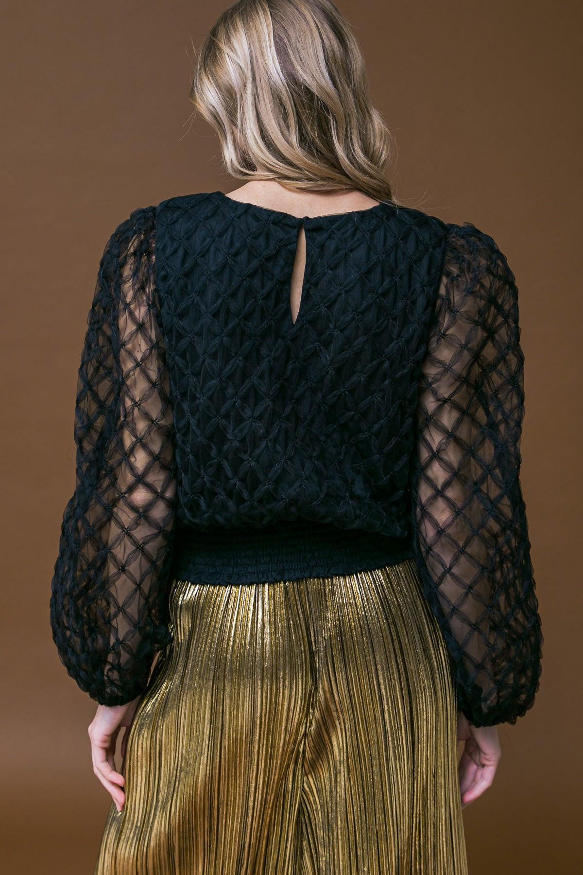 SWEETLY CAPTIVTING WOVEN TOP.